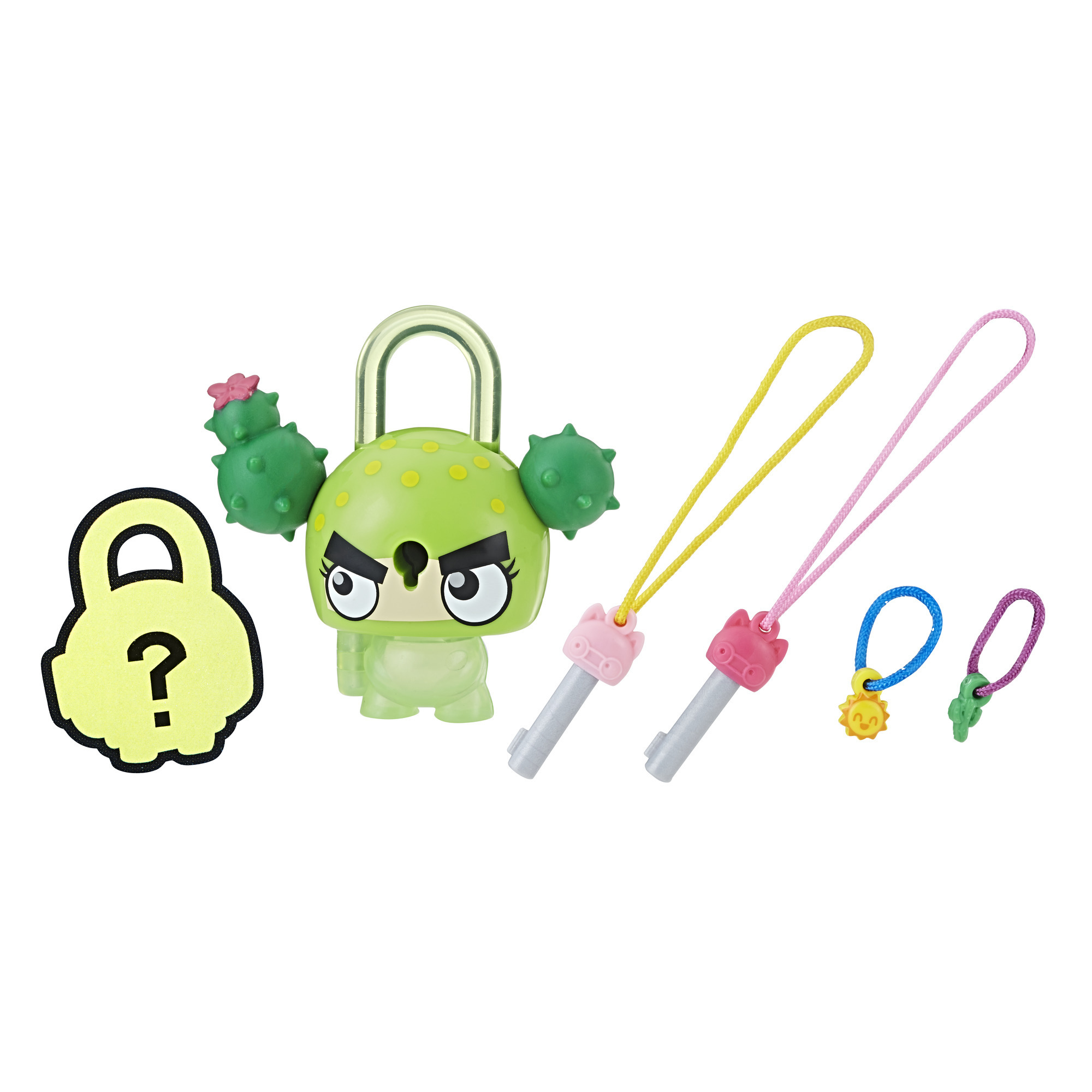 Un giocattolo a forma di cactus verde con chiavi. Include un punto interrogativo e vari accessori colorati.