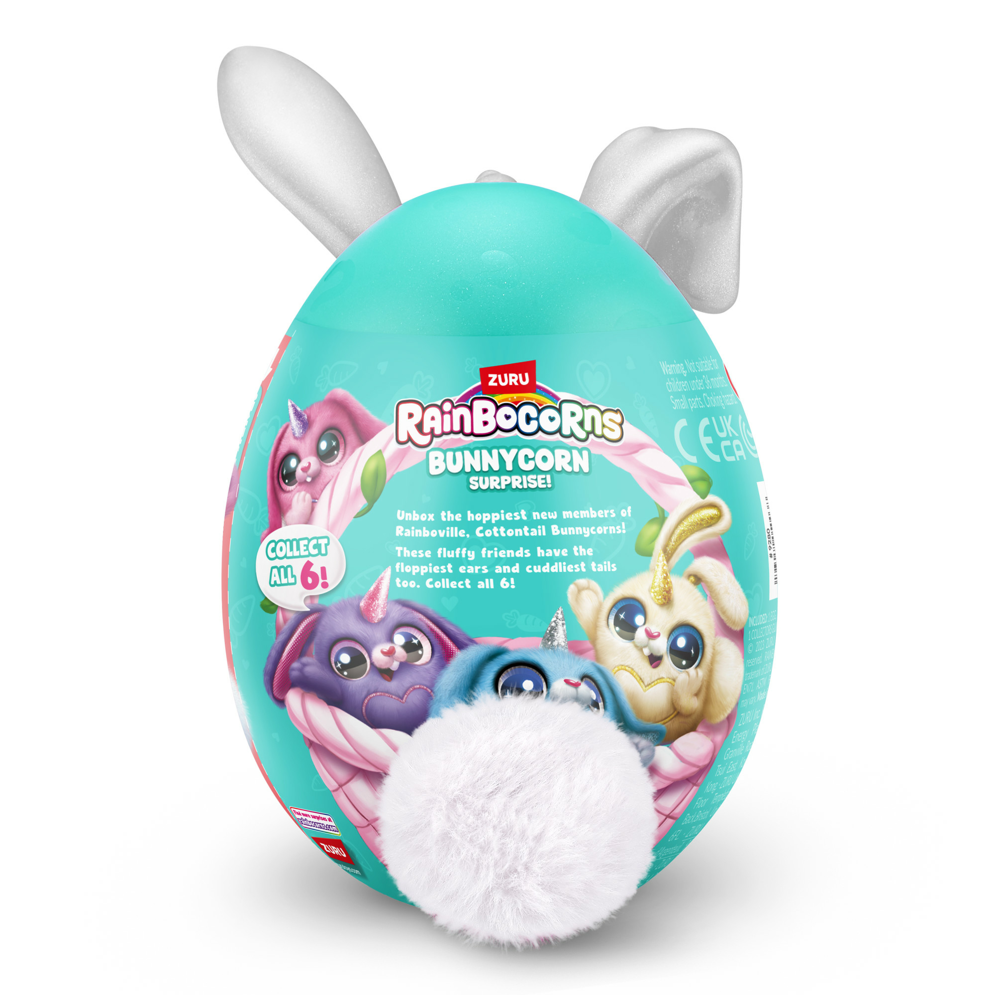 Contenitore a forma di uovo verde acqua con orecchie da coniglio. Contiene giocattoli. Testo: Rainbocorns Bunnycorn Surprise!