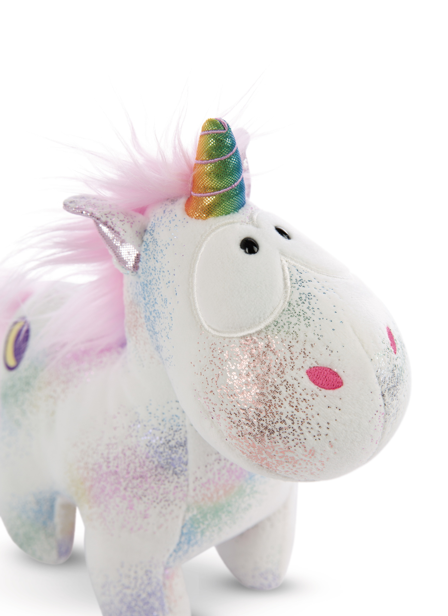 Un unicorno bianco con glitter e un corno arcobaleno. È in piedi, con i capelli rosa e un naso rosa.