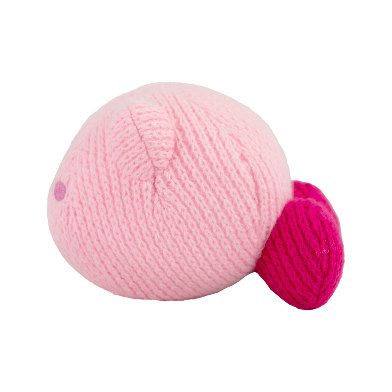 Peluche rosa, rotondo e lavorato a maglia, con faccia rosa e coda rosa scuro.