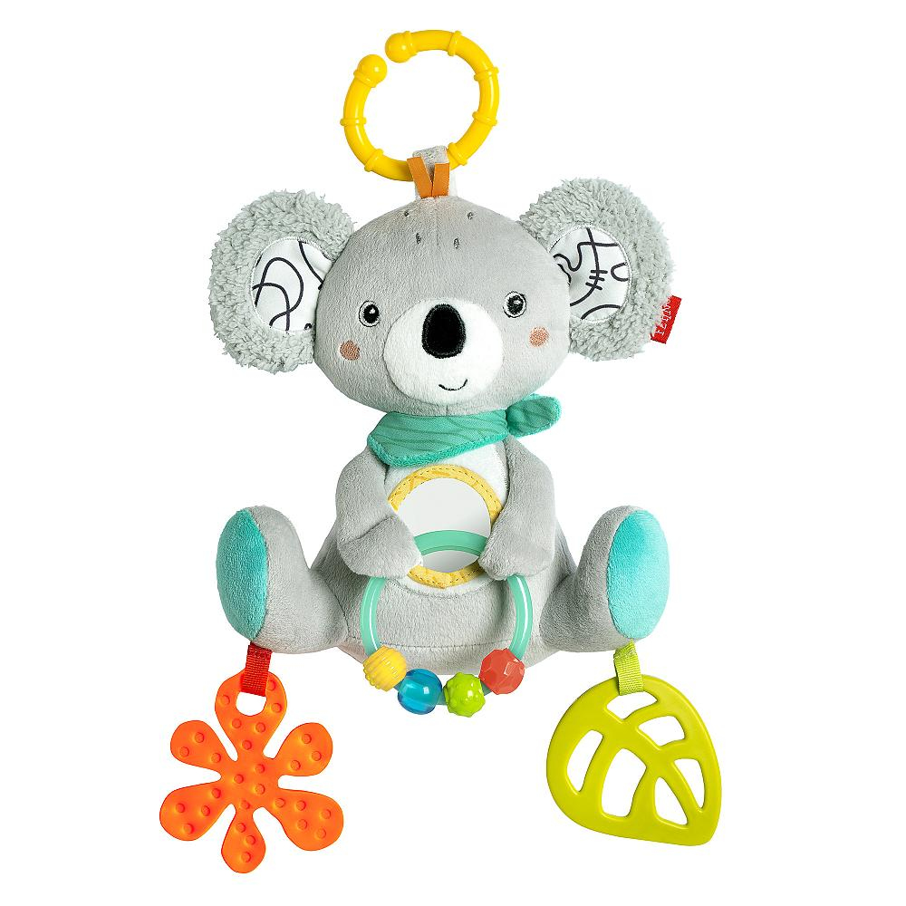 Graues Koala-Spielzeug mit grünem Schal und verschiedenen bunten Formen, die daran hängen.