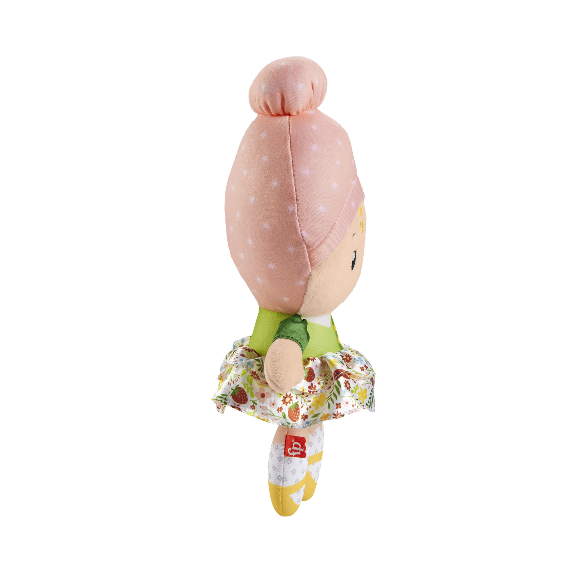 Lalka w sukience z różowym kapeluszem i brązową zabawką w kształcie tęczy.