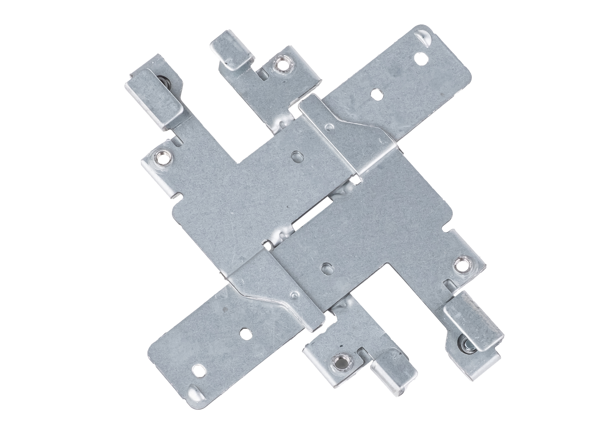 Złożony, srebrny metalowy wspornik, w kształcie krzyża, na białej powierzchni.