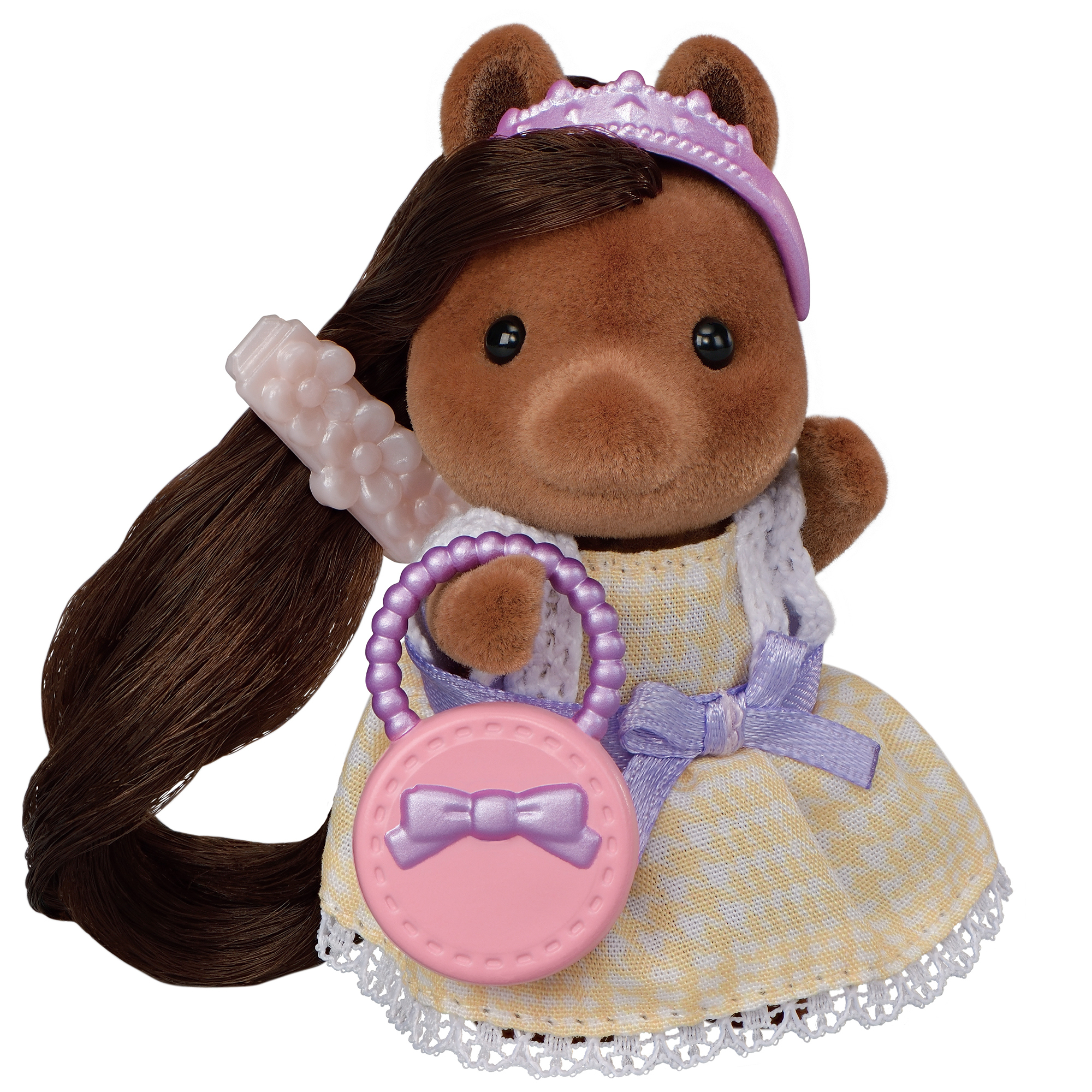 Figura de caballo de juguete con pelo largo, tiara y bolso rosa. Vestido amarillo.