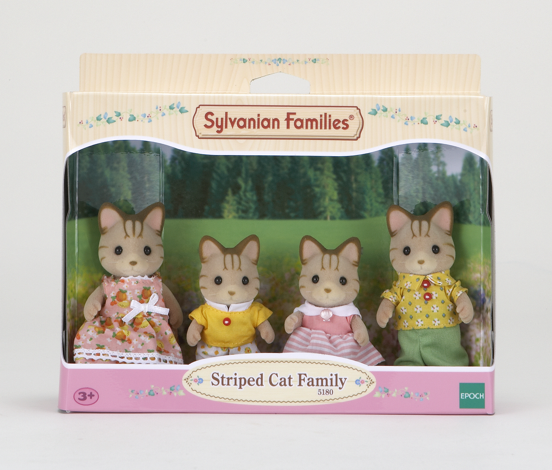 Juego de juguetes de la familia de gatos rayados en una caja. El juego incluye cuatro figuras de gatos con atuendos coloridos.