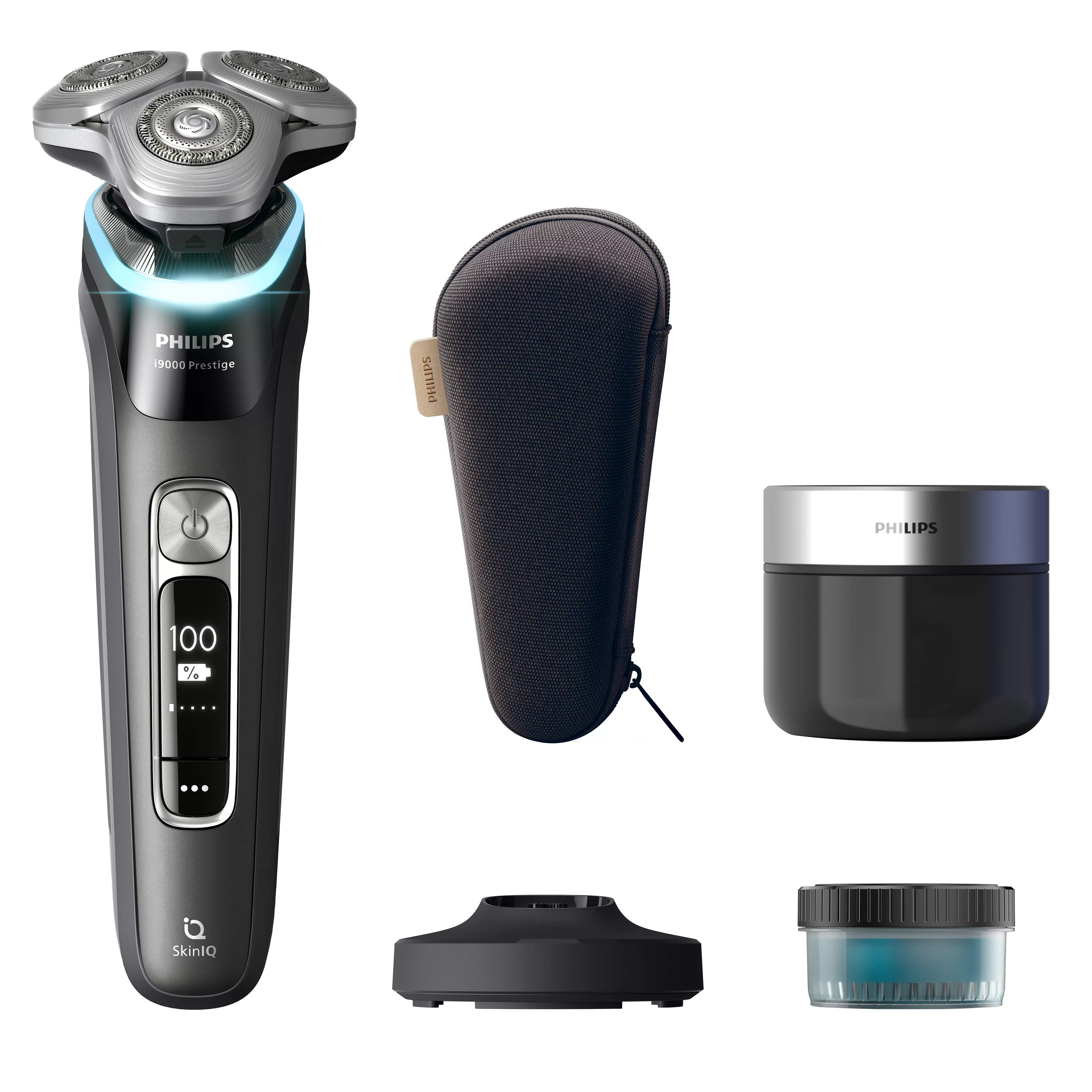 Rasoio elettrico Philips S9000 Prestige e accessori su sfondo bianco. Include custodia, base e detergente.