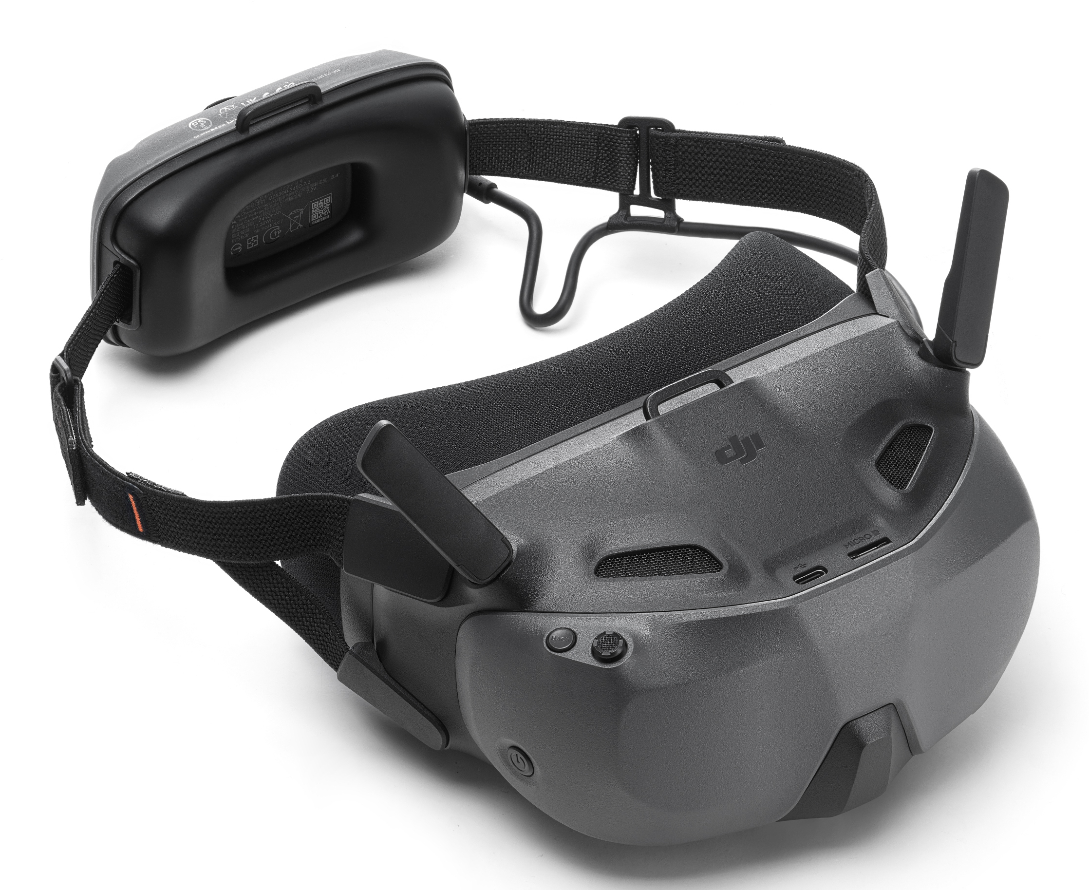 Visore VR per drone. Cuffie nere, fascia per la testa con batteria. Sfondo bianco.