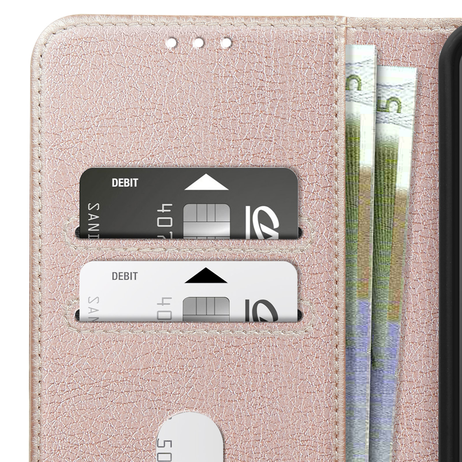 Portafoglio rosa aperto con carte di debito e denaro visibile.