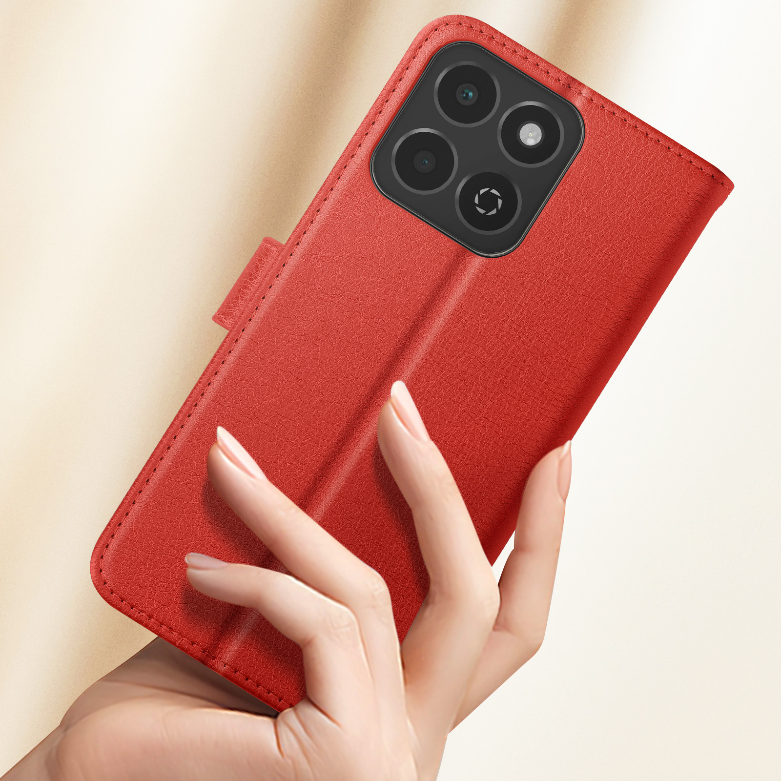 Custodia rossa per telefono, aperta, con telefono e lenti della fotocamera visibili.
