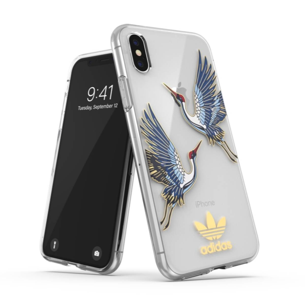 Dos teléfonos: uno con funda transparente con diseño de grulla, el otro negro. Logotipo Adidas.