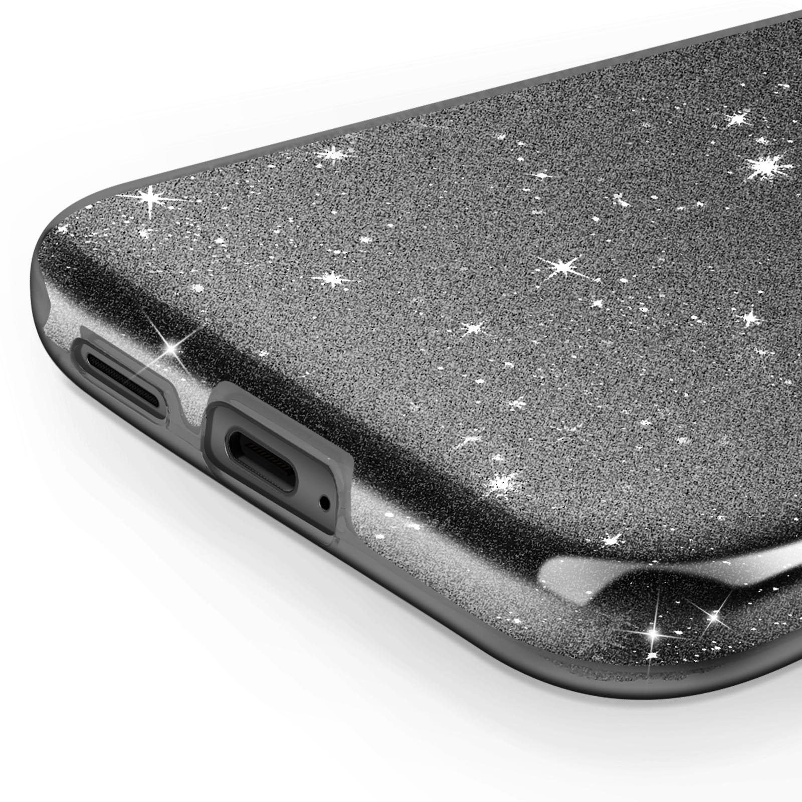Primo piano di una custodia per telefono con superficie argentata glitterata. Ci sono porte e fori.