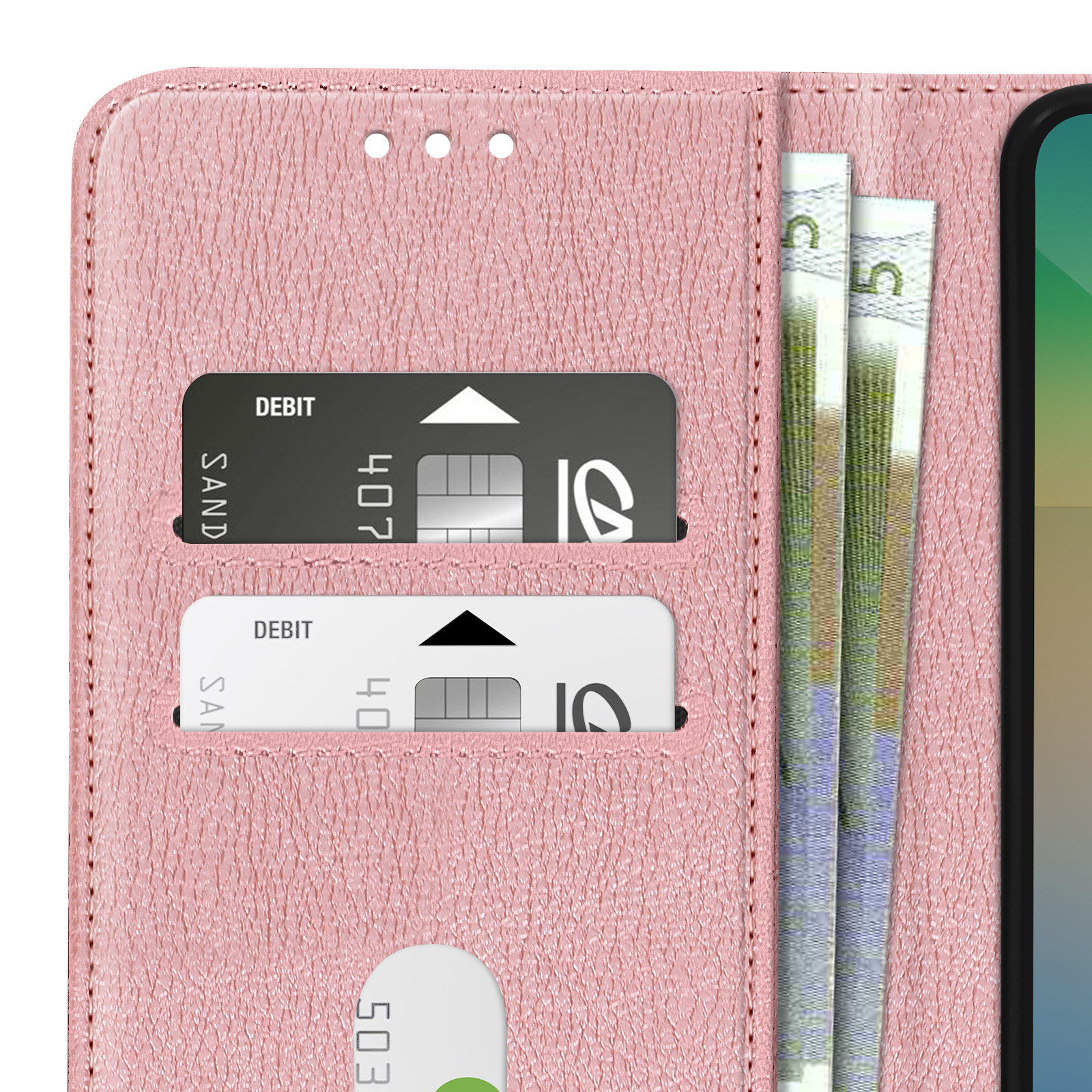 Custodia rosa per telefono, aperta, con carte e denaro. La custodia è su un tavolo.
