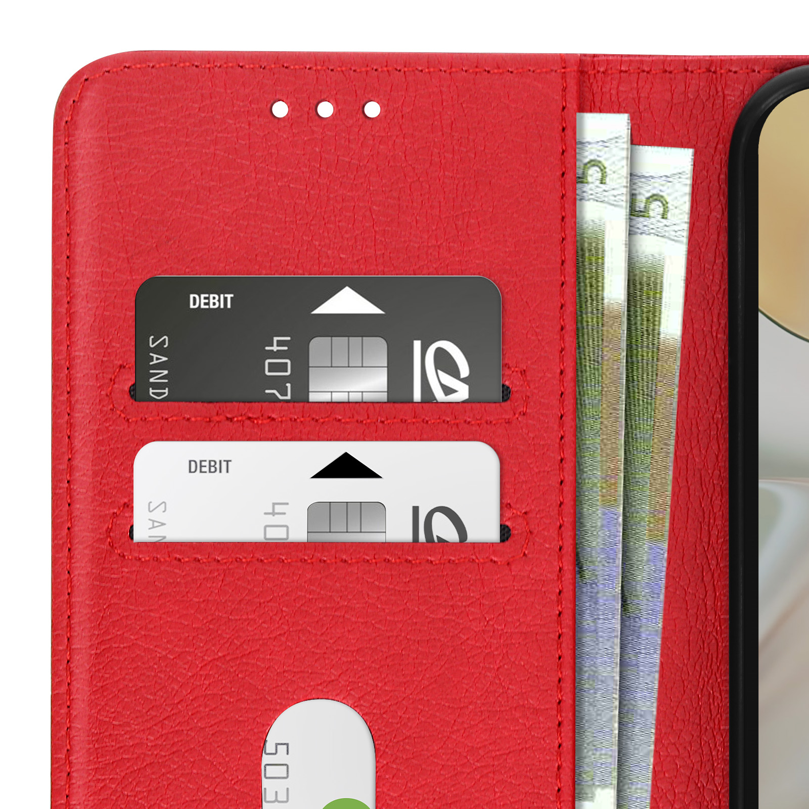 Custodia rosa per telefono, aperta, con carte e denaro. La custodia è su un tavolo.