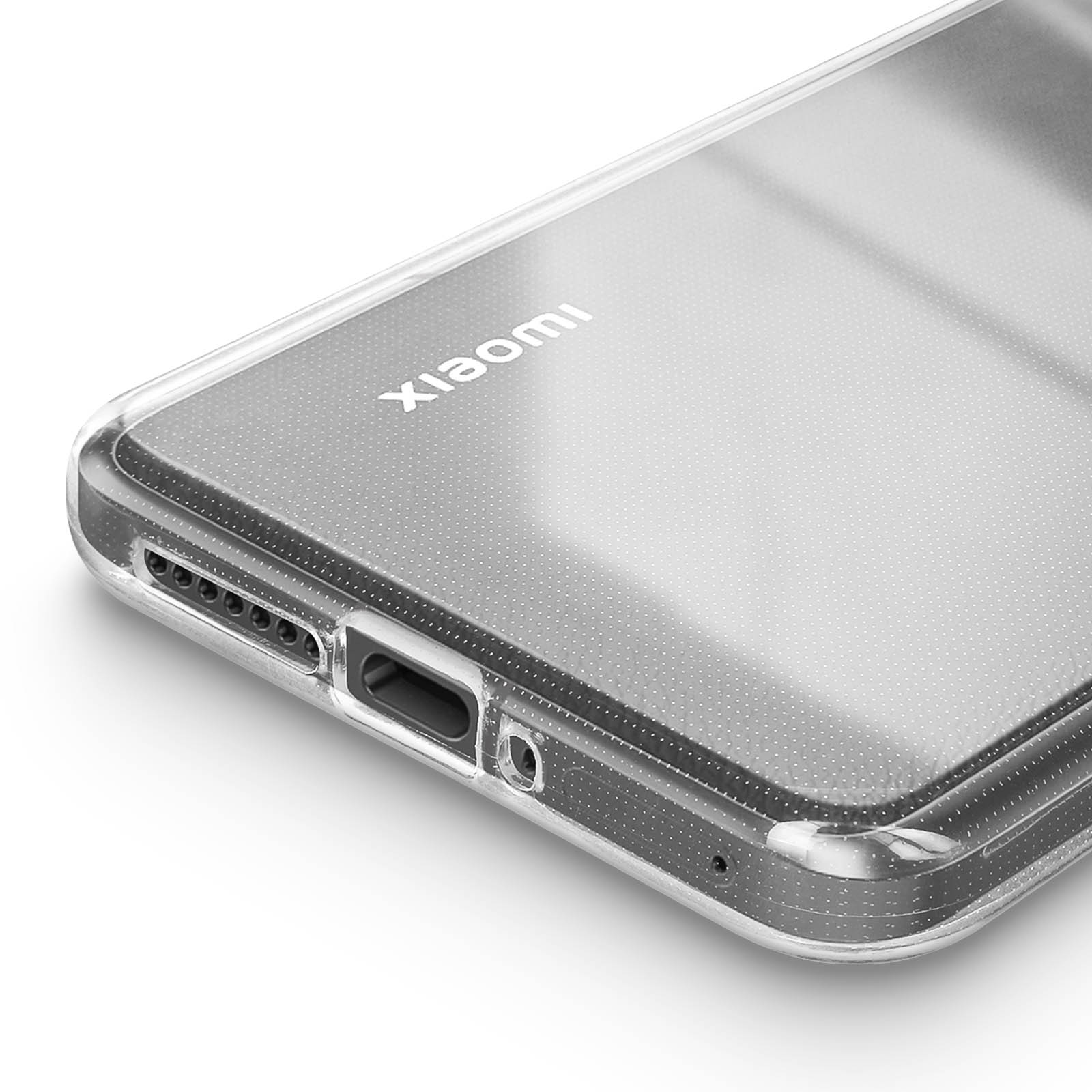 Una custodia trasparente per telefono. Un telefono è all'interno della custodia trasparente. La custodia ha fori per la ricarica e la fotocamera.