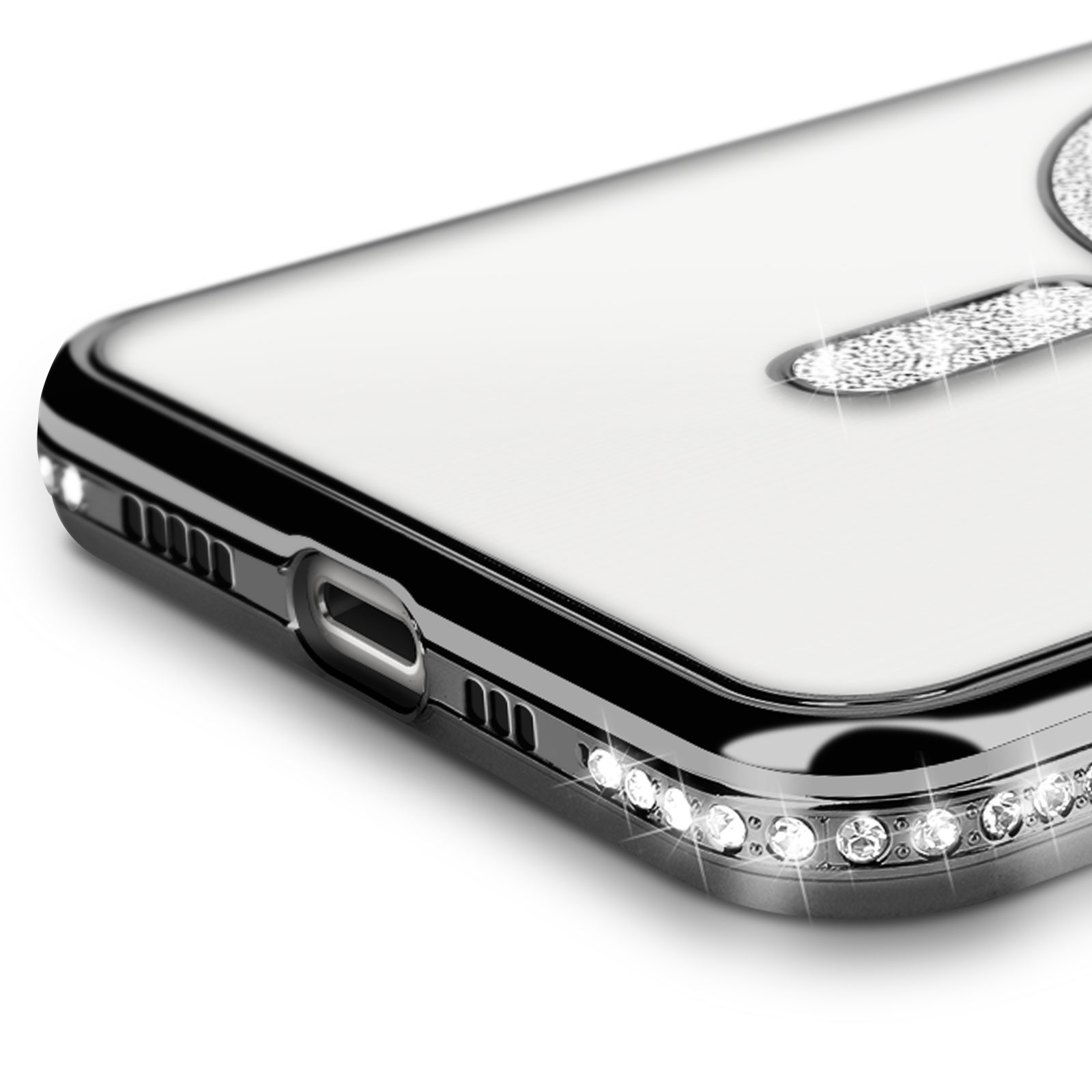 Primo piano di una custodia trasparente con strass sui bordi. Il logo Apple è visibile.