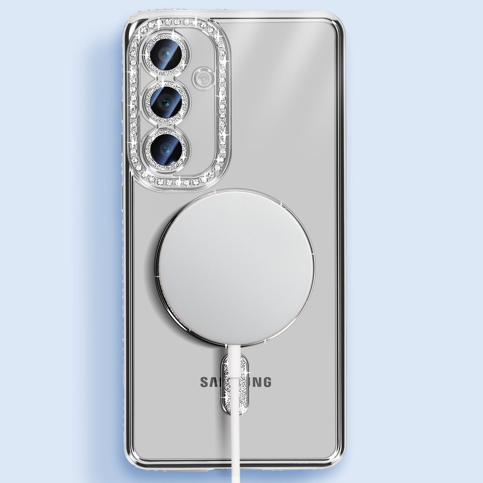 Telefono Samsung argentato con custodia trasparente e cavo di ricarica bianco. La custodia ha un anello per fotocamera.