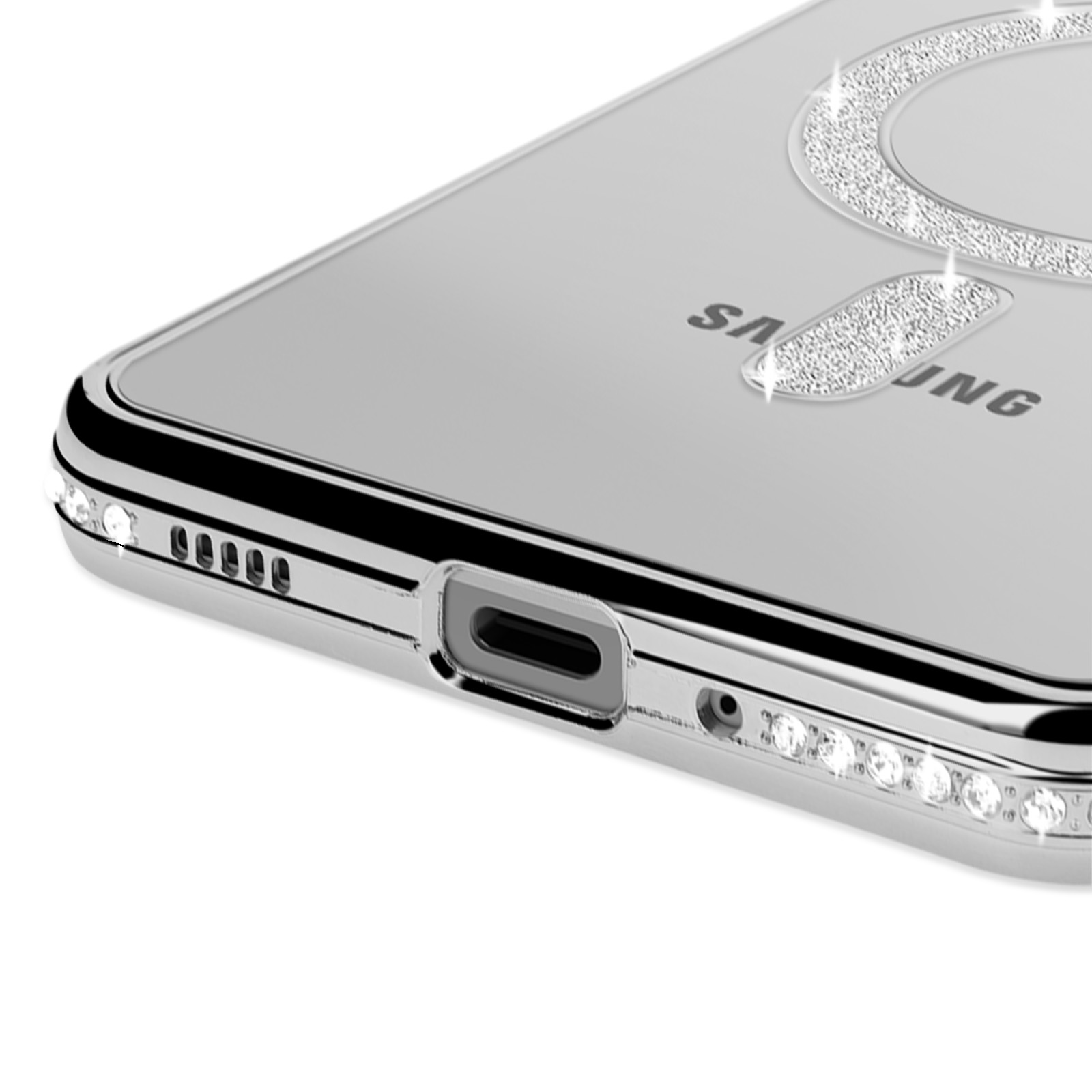 Primo piano della custodia del telefono con strass. La custodia ha un cerchio e una porta di ricarica.