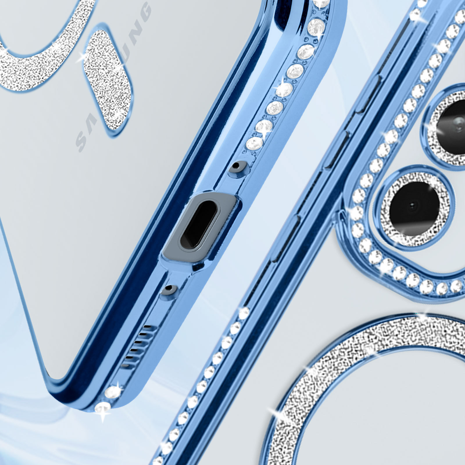 Primo piano di una custodia per telefono blu con diamanti. La custodia ha un anello e un retro trasparente.