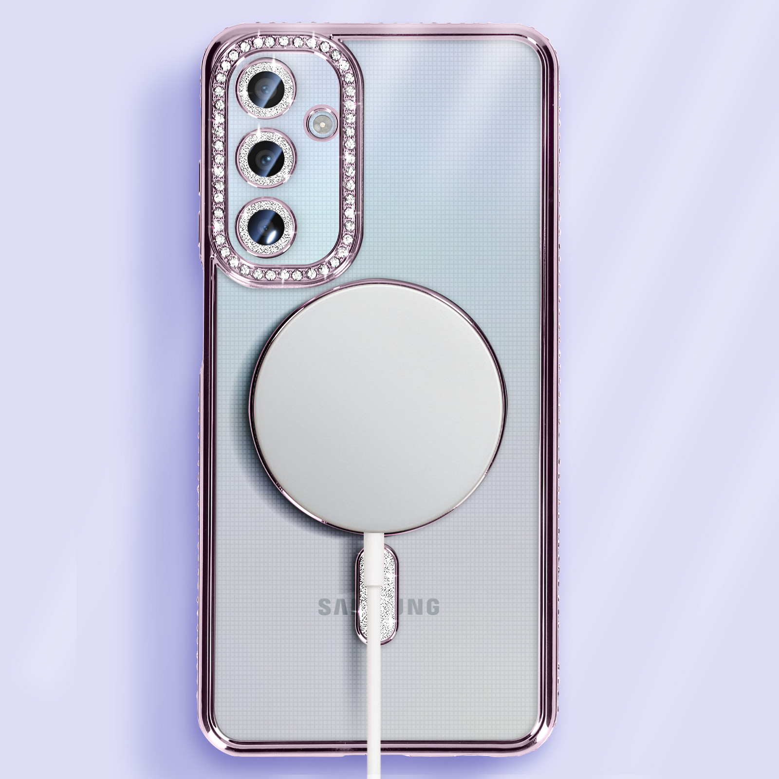 Custodia trasparente con finiture oro rosa, decorata con cristalli attorno alla fotocamera e caricatore bianco.