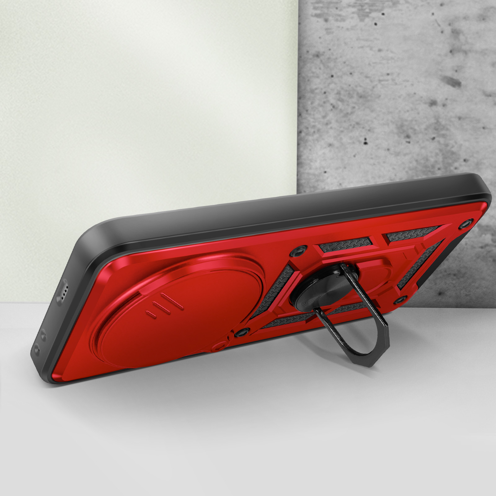 Custodia rossa con dettagli neri, supporto ad anello e sfondo strutturato.