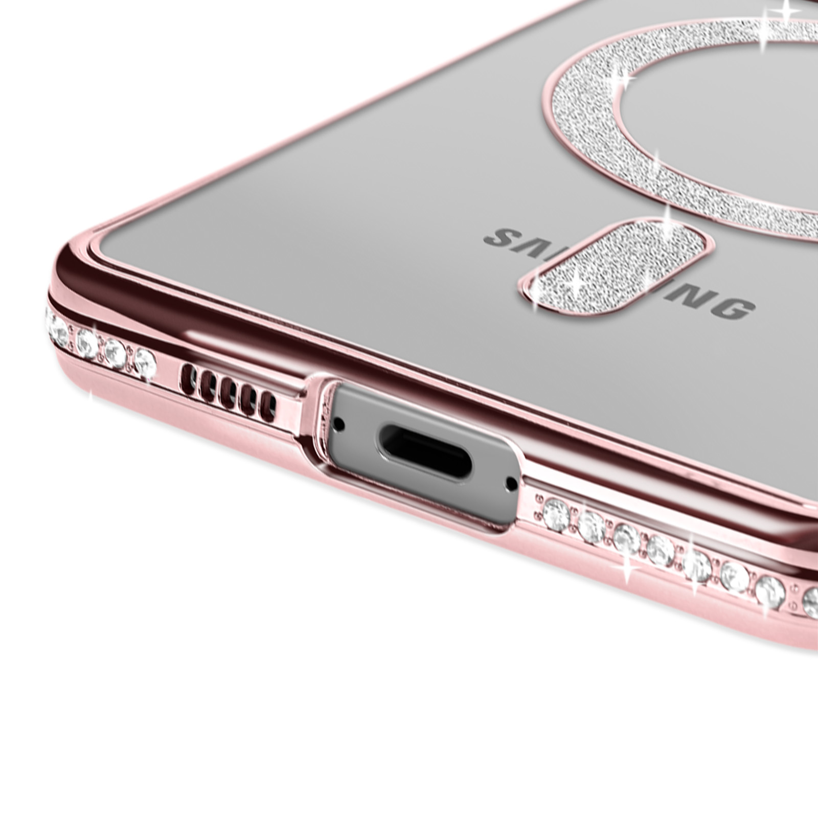 Primo piano della parte inferiore di un telefono con custodia rosa diamante, che mostra la porta di ricarica.