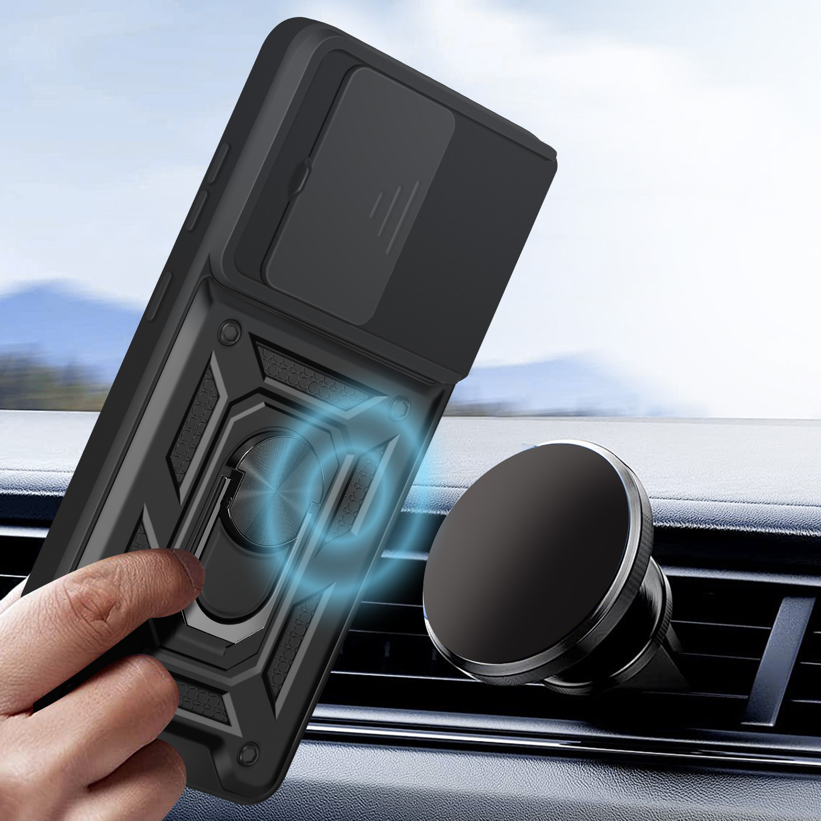 Schwarze Handyhülle mit Kameraabdeckung und Ringhalter, neben einer Autolüftungshalterung. Das Telefon ist abgewinkelt.