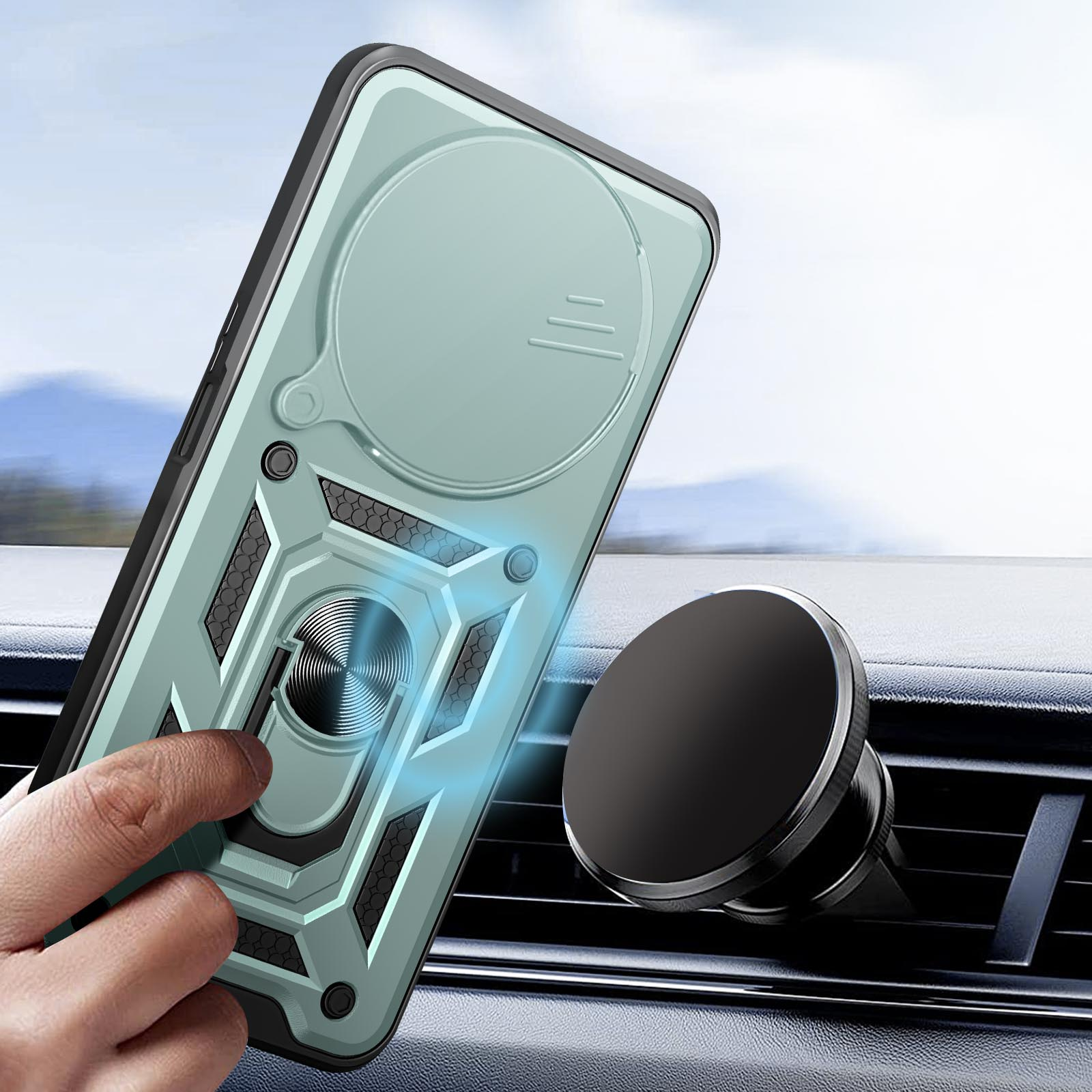 Una custodia per telefono con anello di supporto in un'auto. Una mano tiene il telefono vicino a una presa d'aria dell'auto.