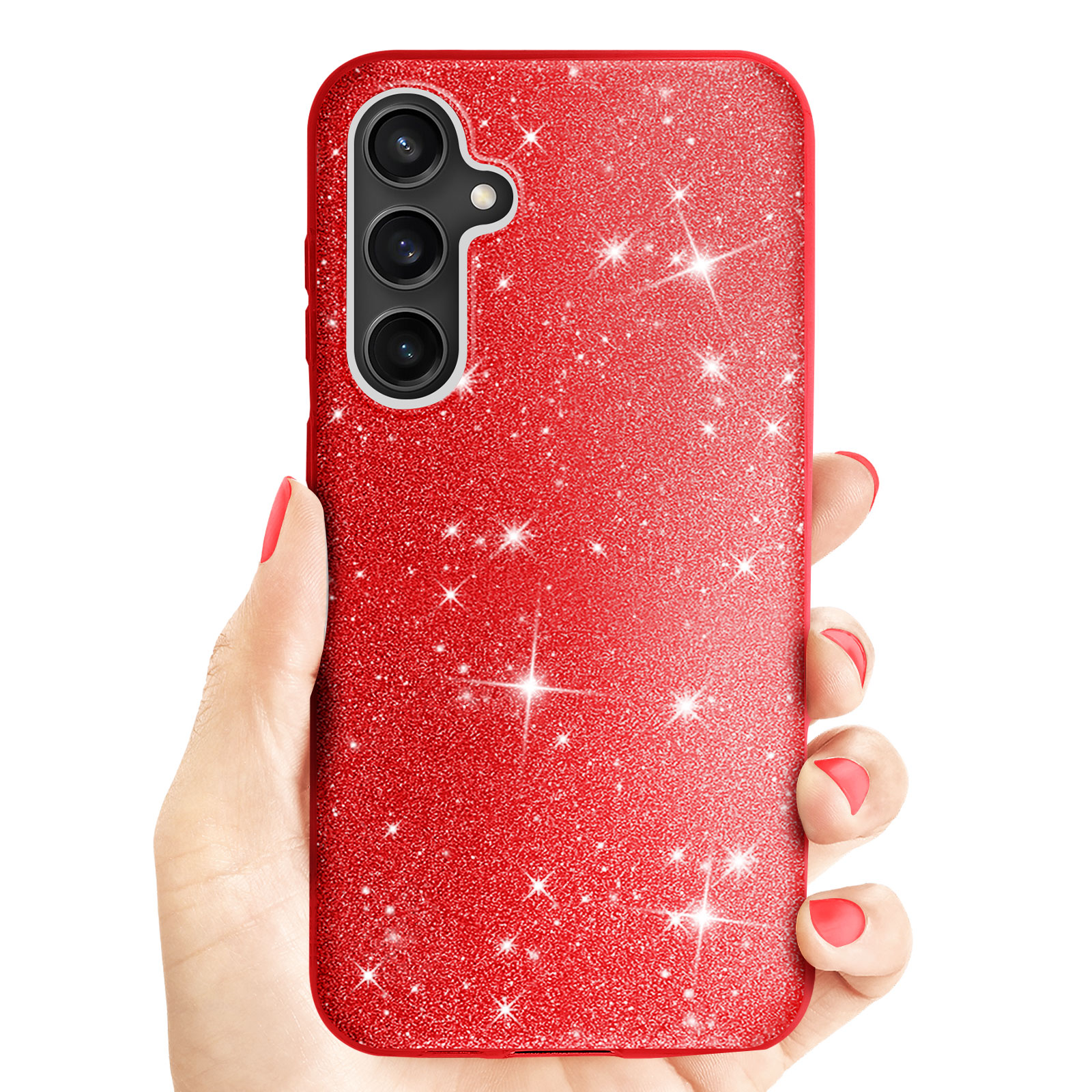 Una mano che tiene una custodia per telefono rossa con glitter e tre obiettivi. Smalto rosso visibile.
