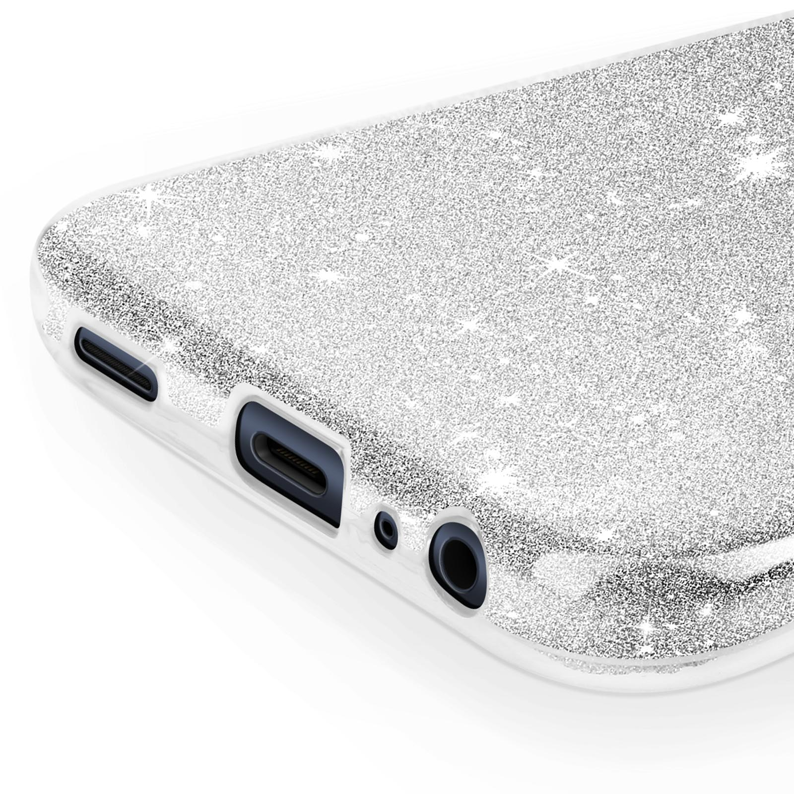 Primo piano di una cover per telefono glitterata argentata, che mostra le porte e uno sfondo bianco.
