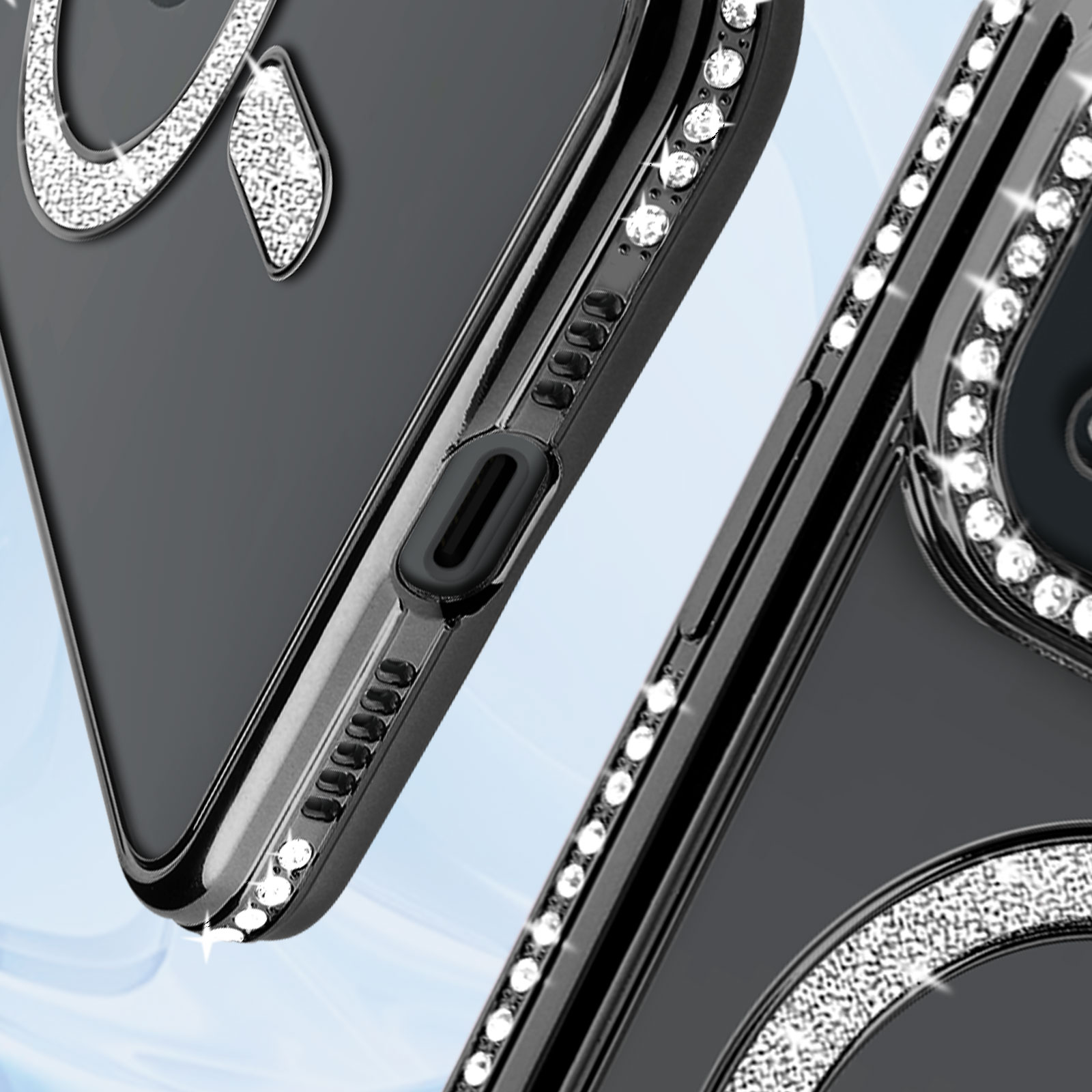 Primo piano della custodia del telefono con strass e dettagli argentati. Custodia nera. Sfondo bianco.