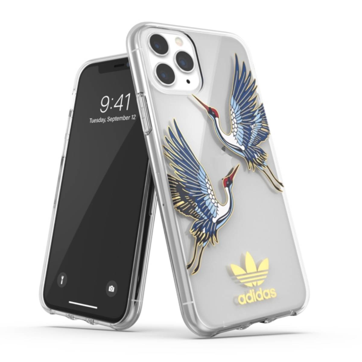 Custodia trasparente con due disegni di gru e logo Adidas. Telefono a sinistra. Sfondo bianco.