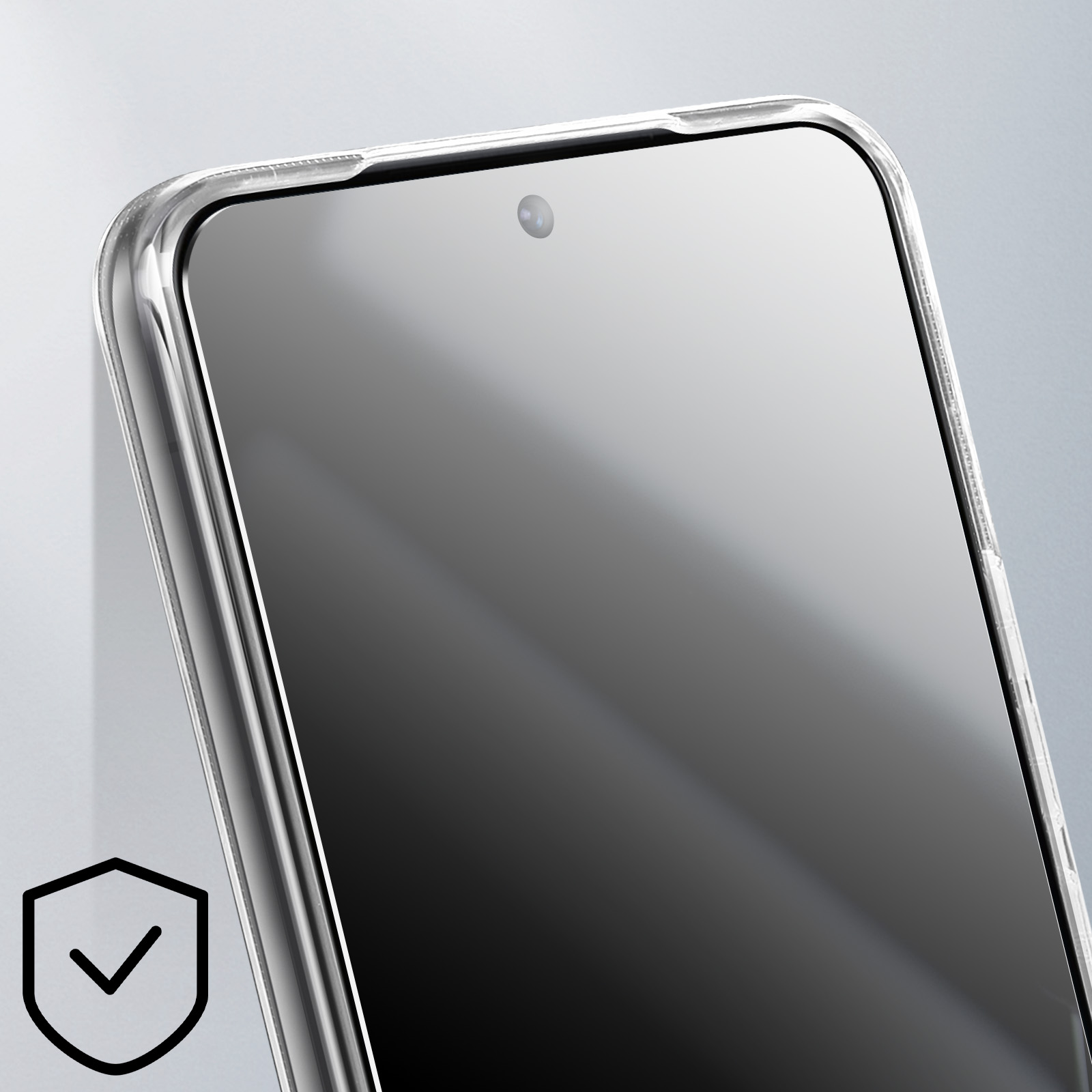 Primo piano dello schermo del telefono con custodia trasparente. Icona del segno di spunta. Sfondo grigio.