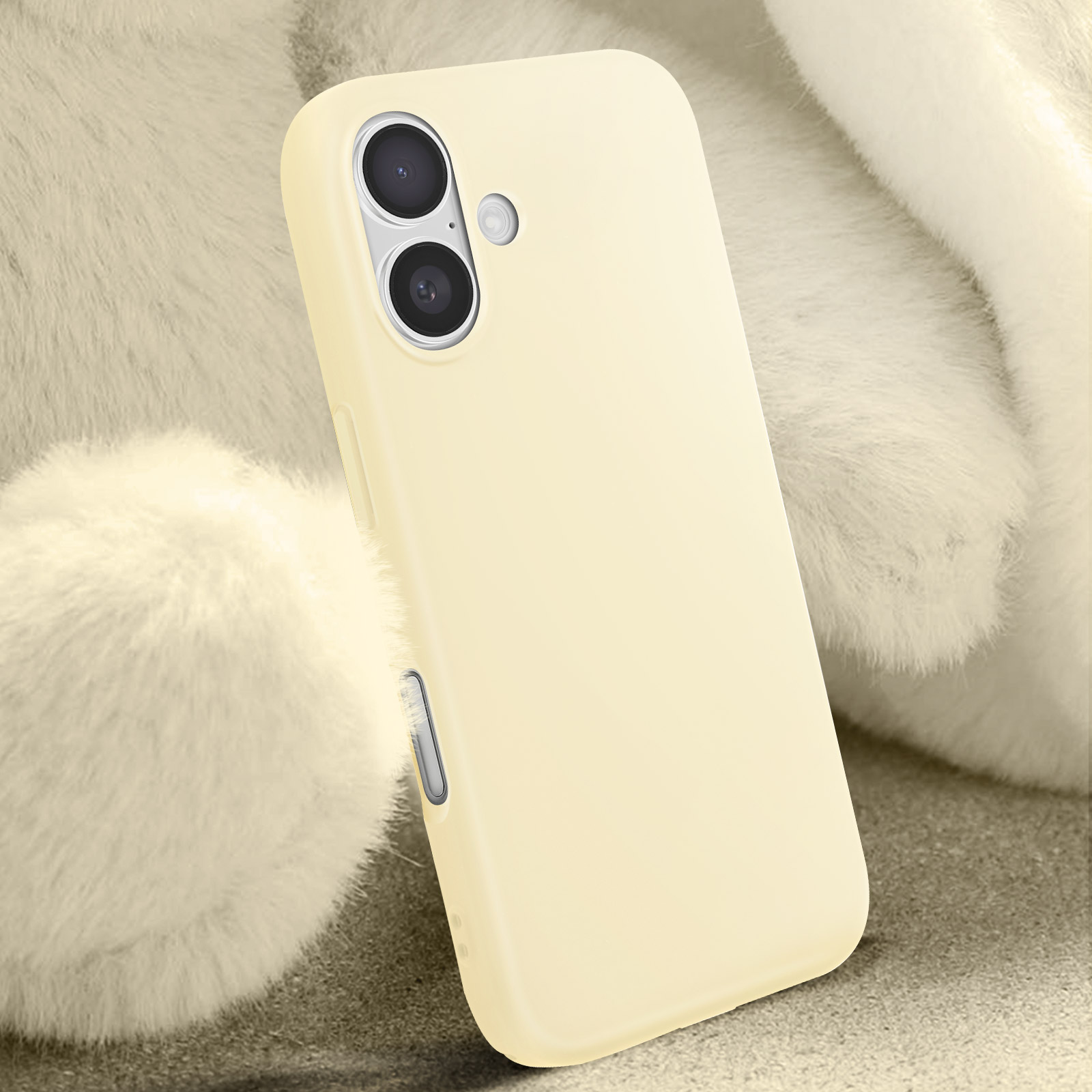 Custodia giallo pallido su sfondo sfocato. Due obiettivi della fotocamera visibili.