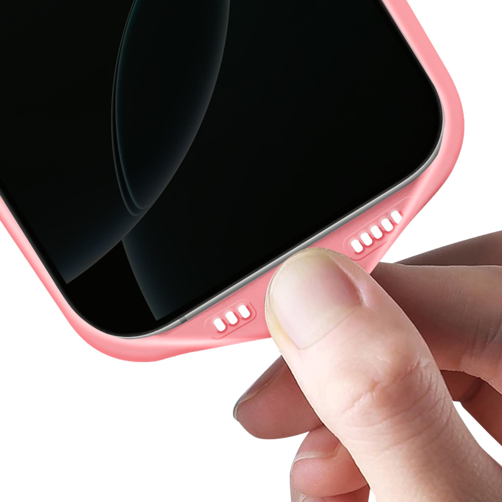Coque de téléphone rose, gros plan sur le bas, montrant les trous du haut-parleur et du port.
