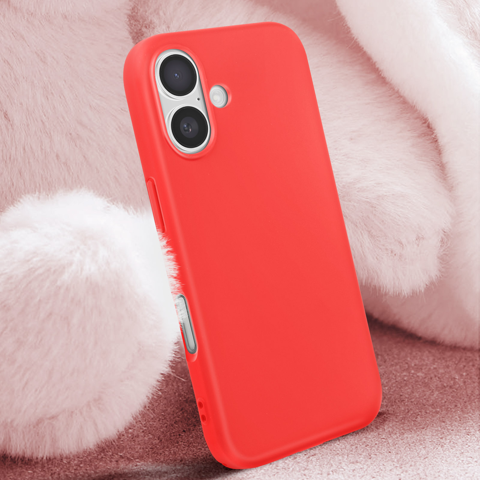 Custodia per telefono rossa su una superficie soffice. La custodia ha un ritaglio per la fotocamera.