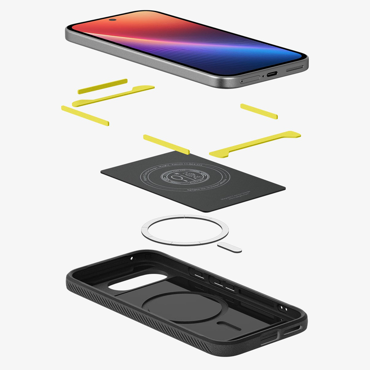 Vista esplosa di un telefono con componenti della custodia, inclusi adesivi gialli, custodia nera e un anello d'argento.