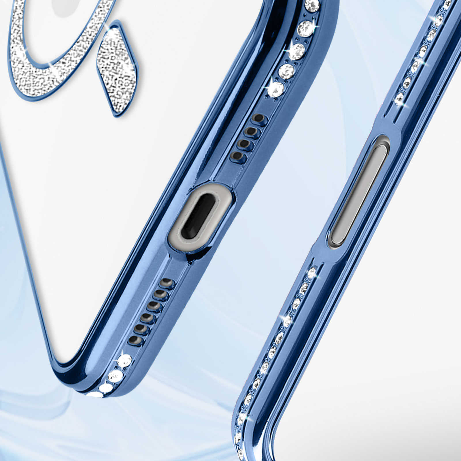Primo piano di una custodia blu per telefono con cristalli attorno ai bordi e alle porte del telefono.