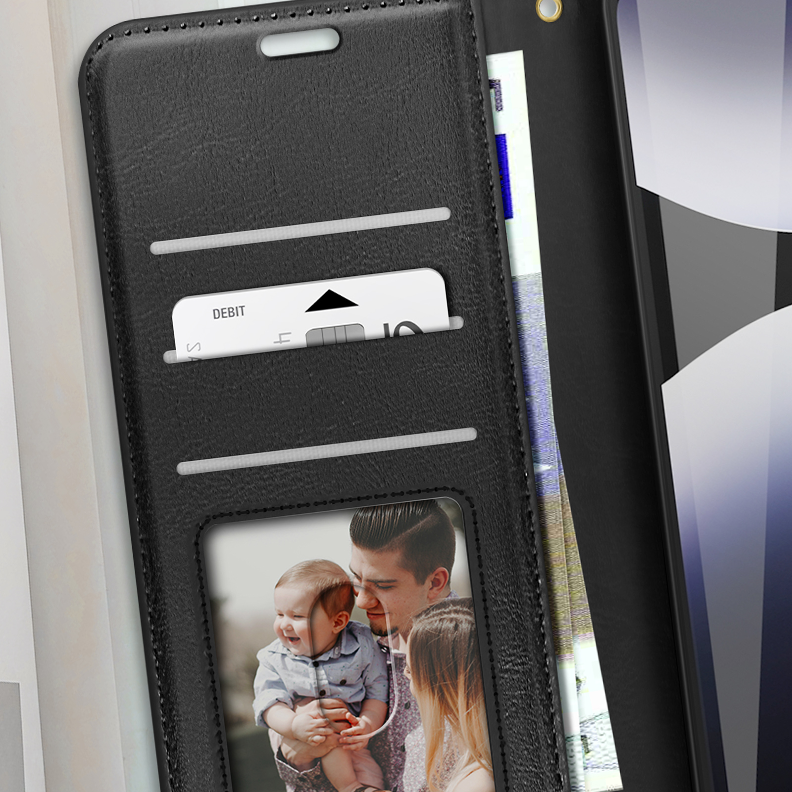 Custodia nera per telefono con design a portafoglio. Contiene telefono, carte e foto.