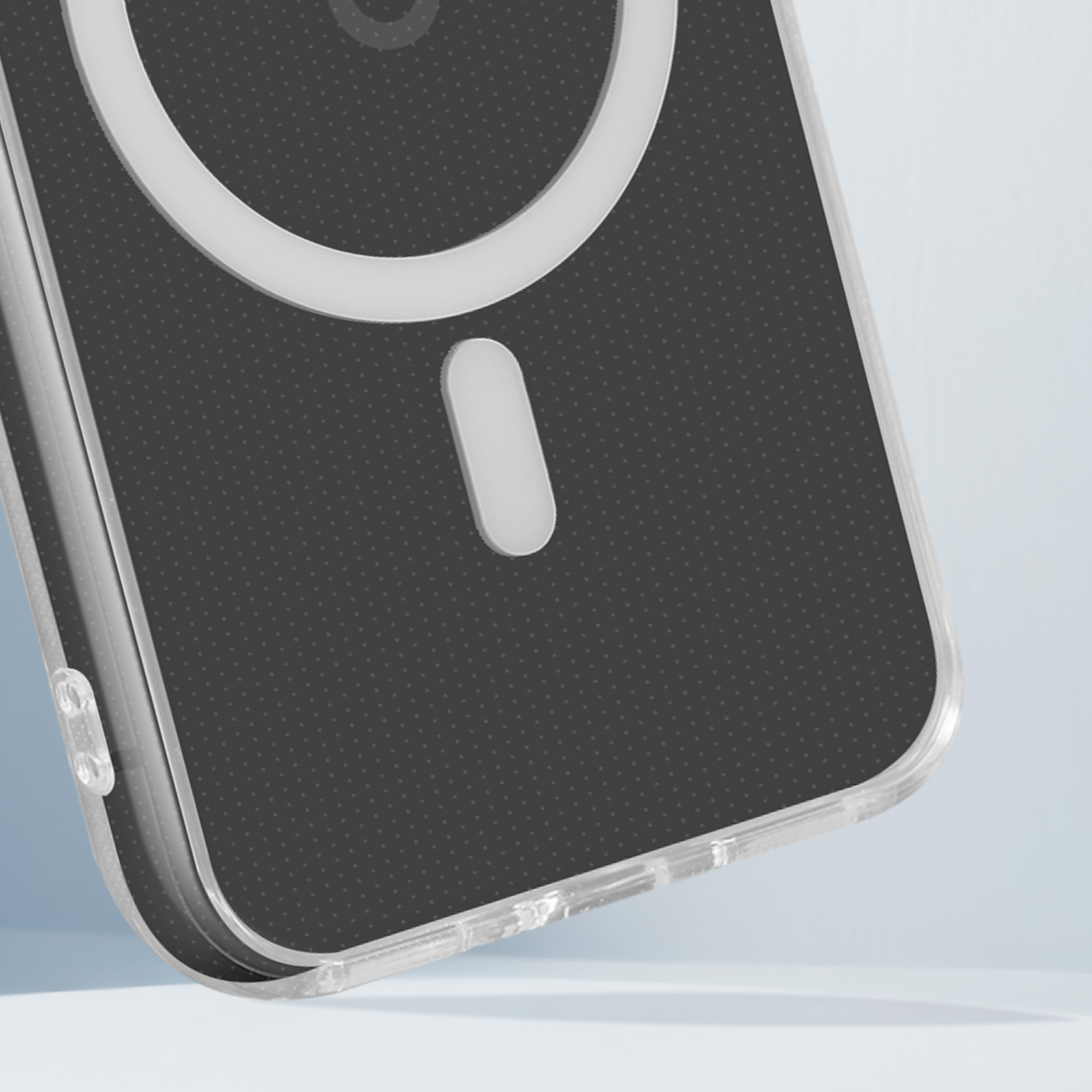 Primo piano di una custodia per telefono. Trasparente con design a cerchio bianco. Sfondo nero.