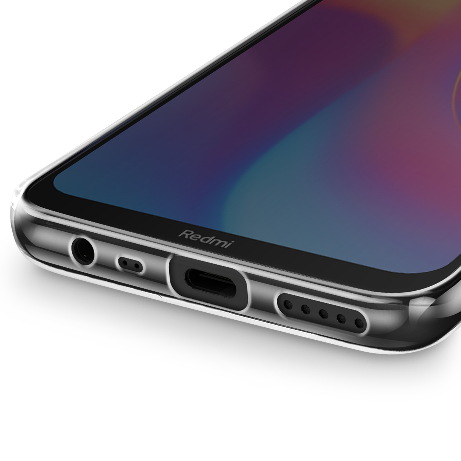 Custodia trasparente su telefono. In basso sono visibili le porte. Logo Redmi visibile.