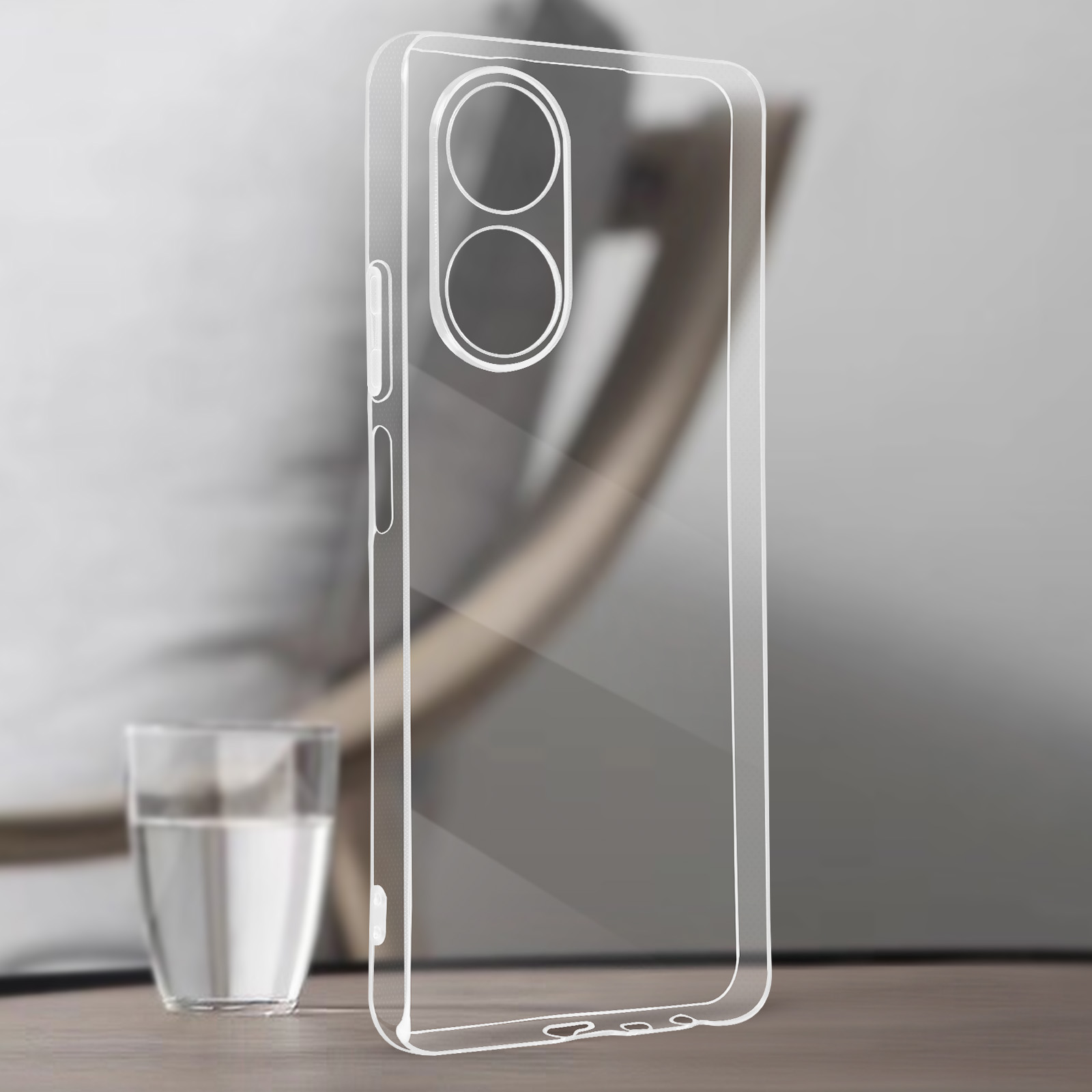 Custodia trasparente per telefono, che mostra il contorno di un telefono con ritagli per la fotocamera. Sfondo sfocato.