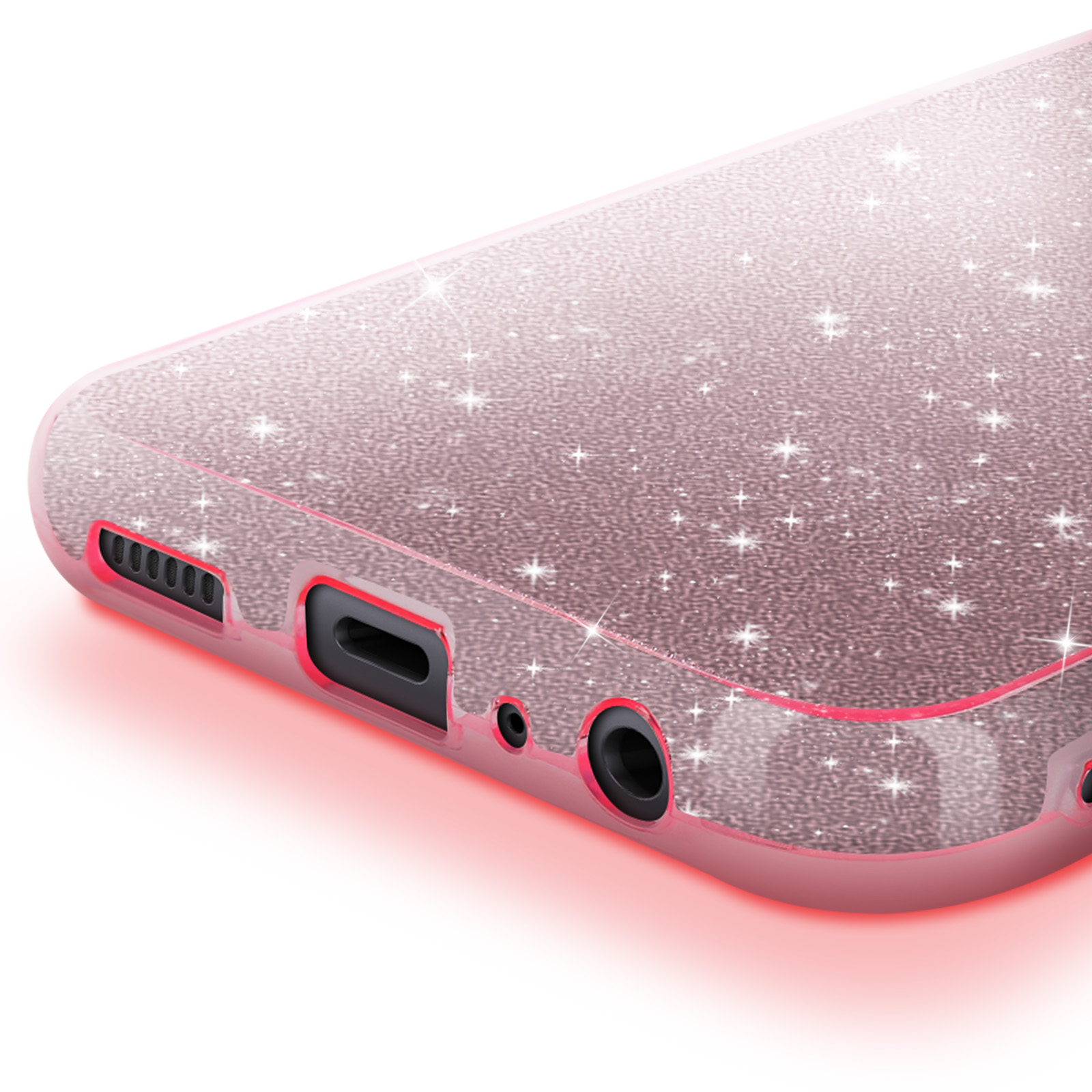 Primo piano di una custodia per telefono rosa glitterata, con fori e contorno rosso.
