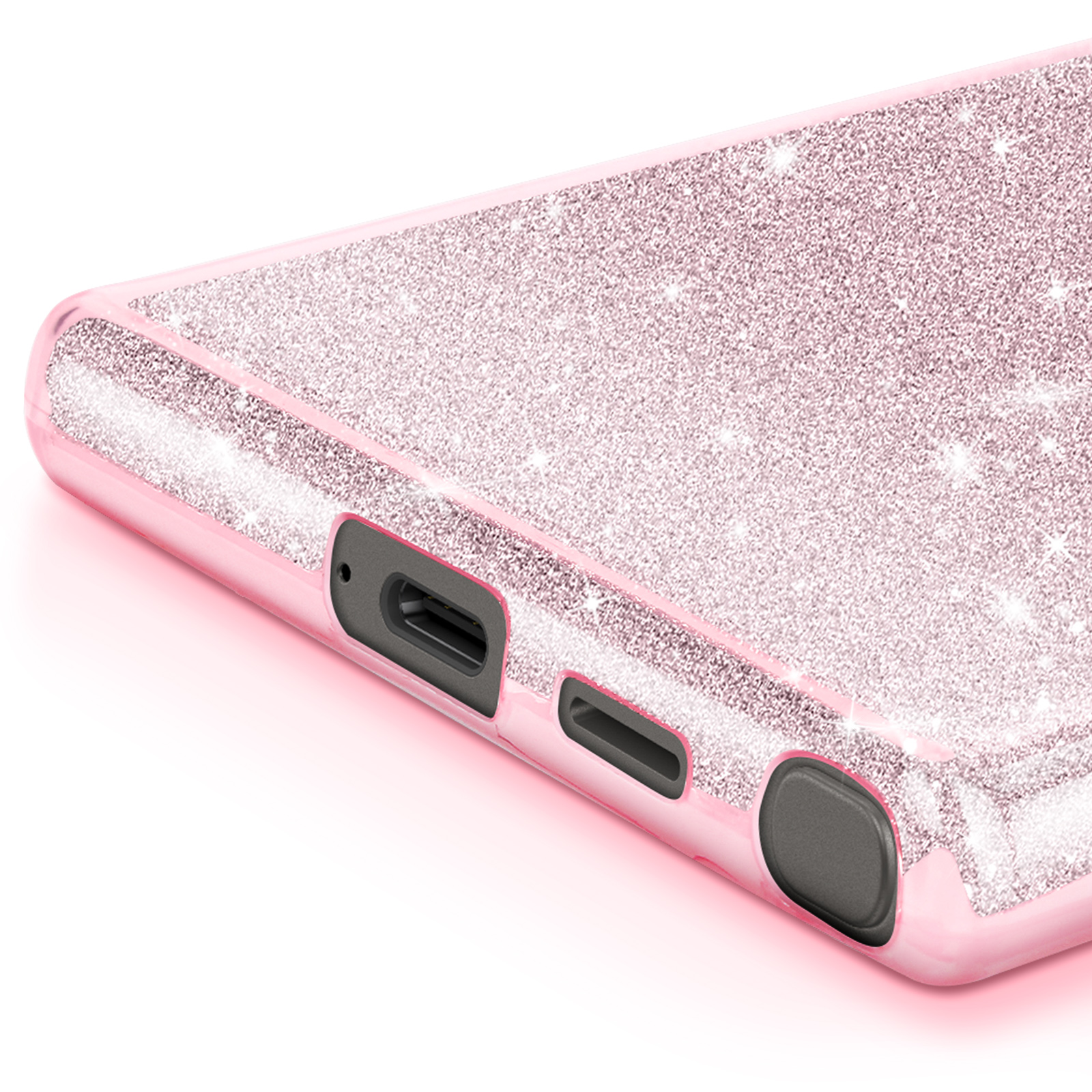 Primo piano di una custodia per telefono rosa glitterata con porte e aperture.