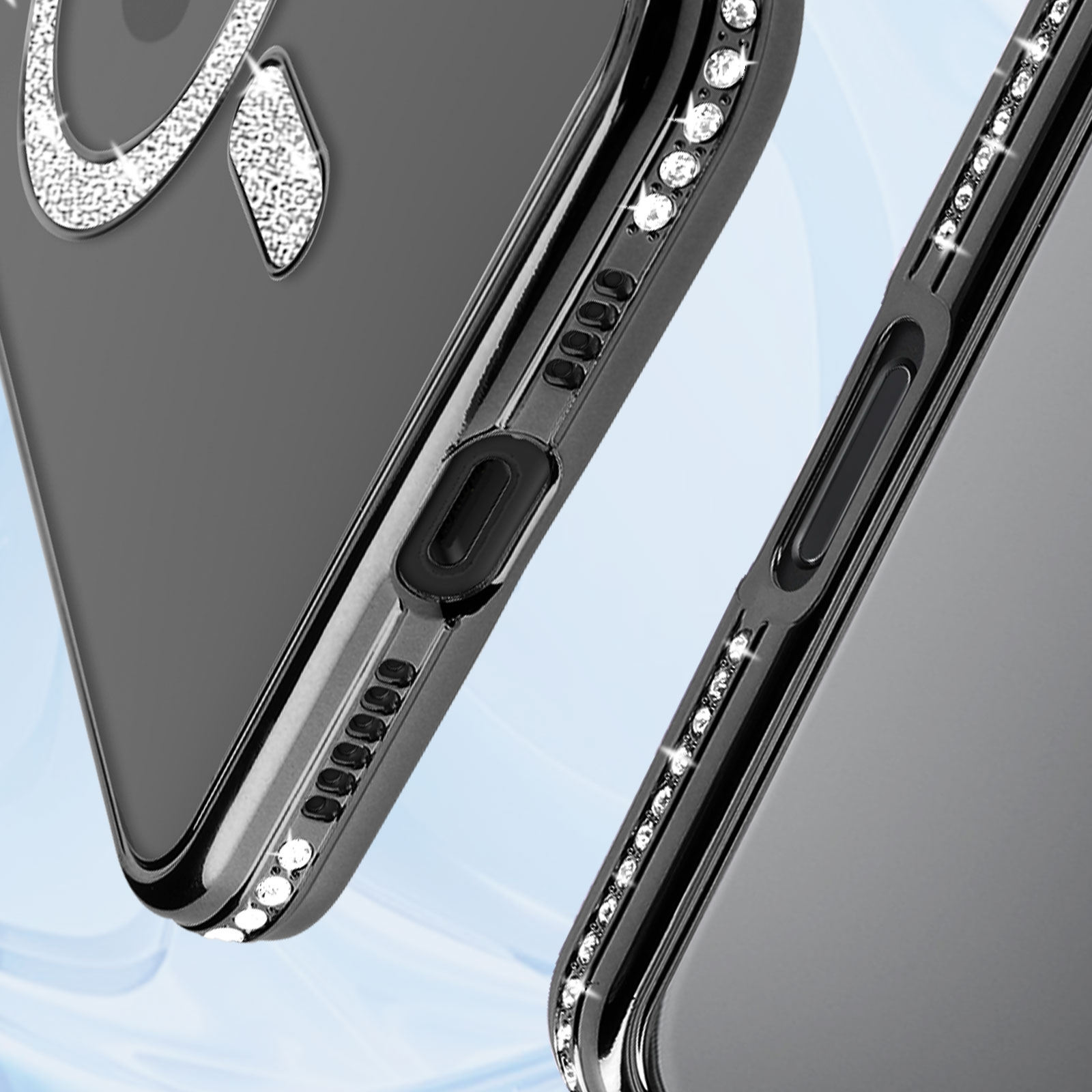 Gros plan sur une coque de téléphone noire avec des strass. L'étui a un côté avec des boutons et des trous.