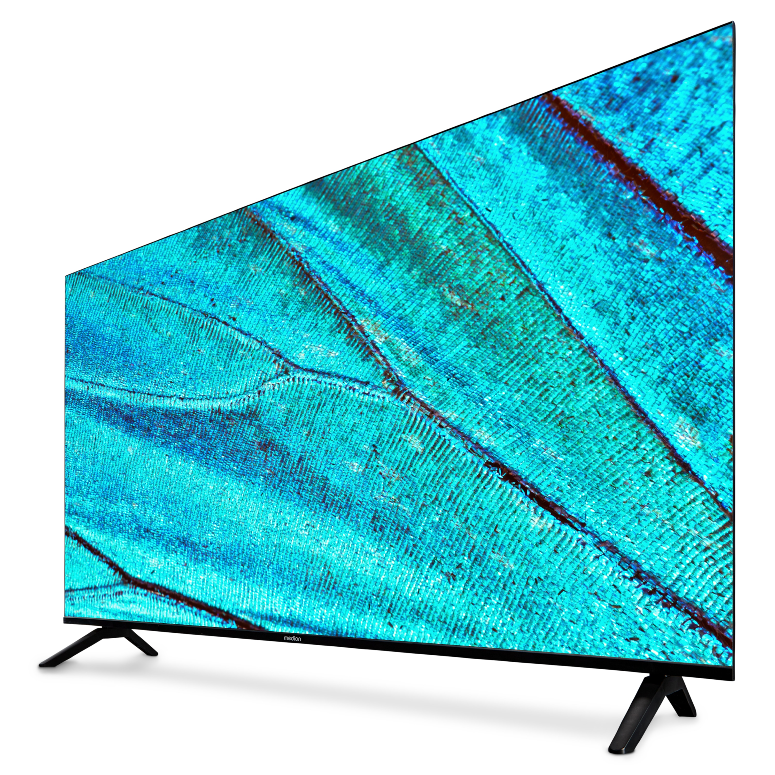 Ein Medion-Fernseher mit blauem Schmetterlingsflügelmuster, auf einer weißen Oberfläche, schräge Ansicht.