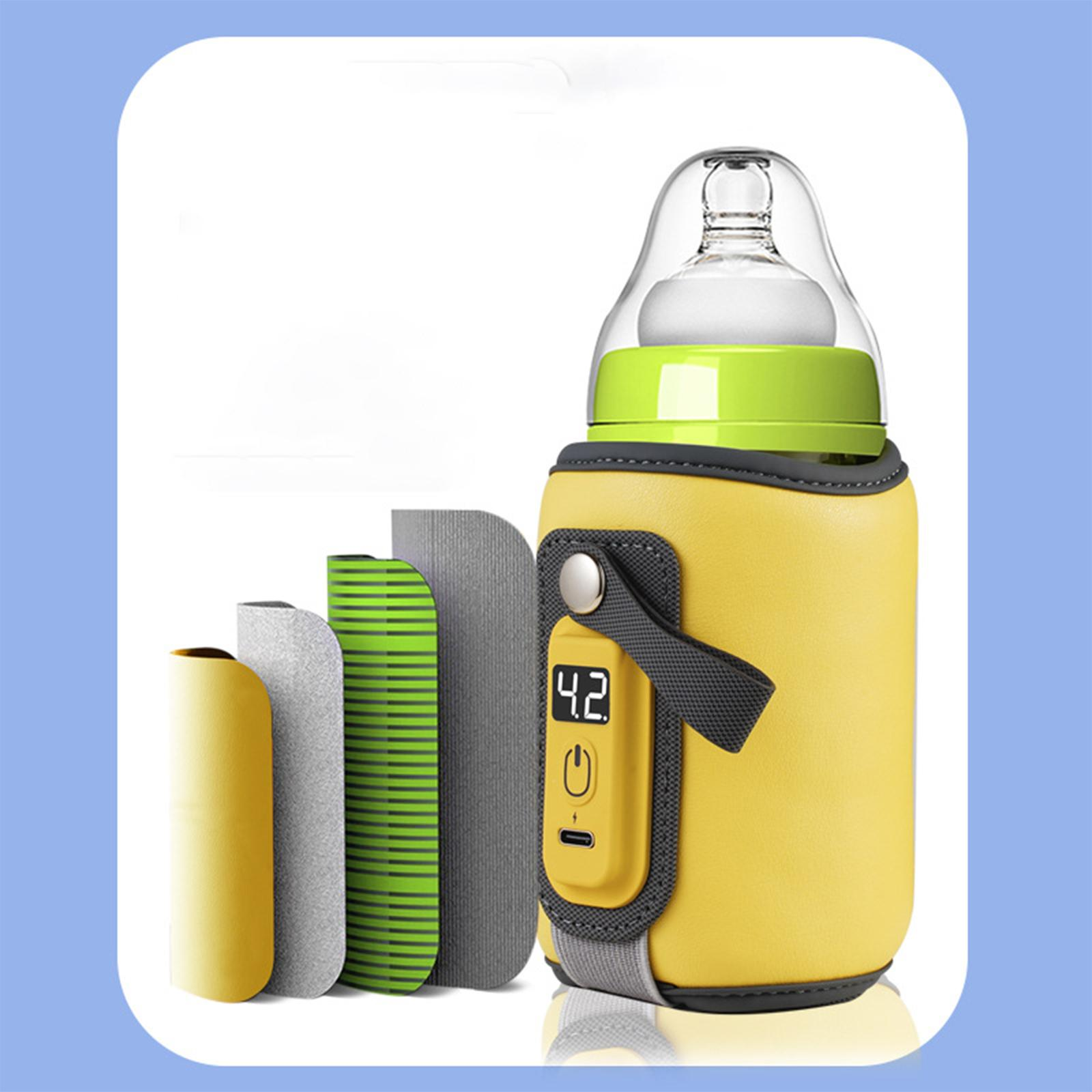 Gelb isolierte Babyflasche mit Digitalanzeige, die die Temperatur anzeigt. Zusätzliche Hüllen daneben.