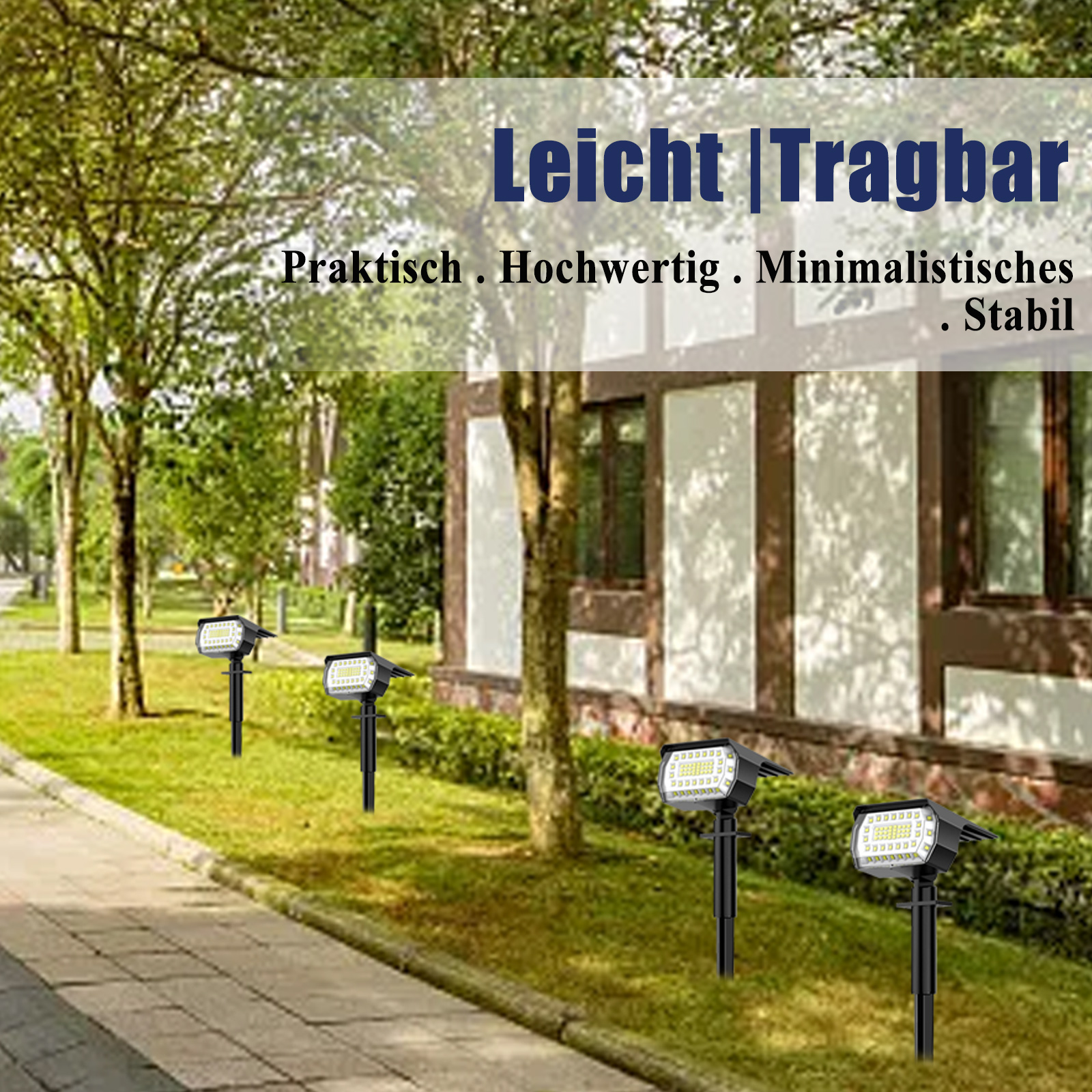 Eine Reihe von Solar-Gartenleuchten entlang des Grases. Die Leuchten sind schwarz mit weißem Licht, vor Bäumen.