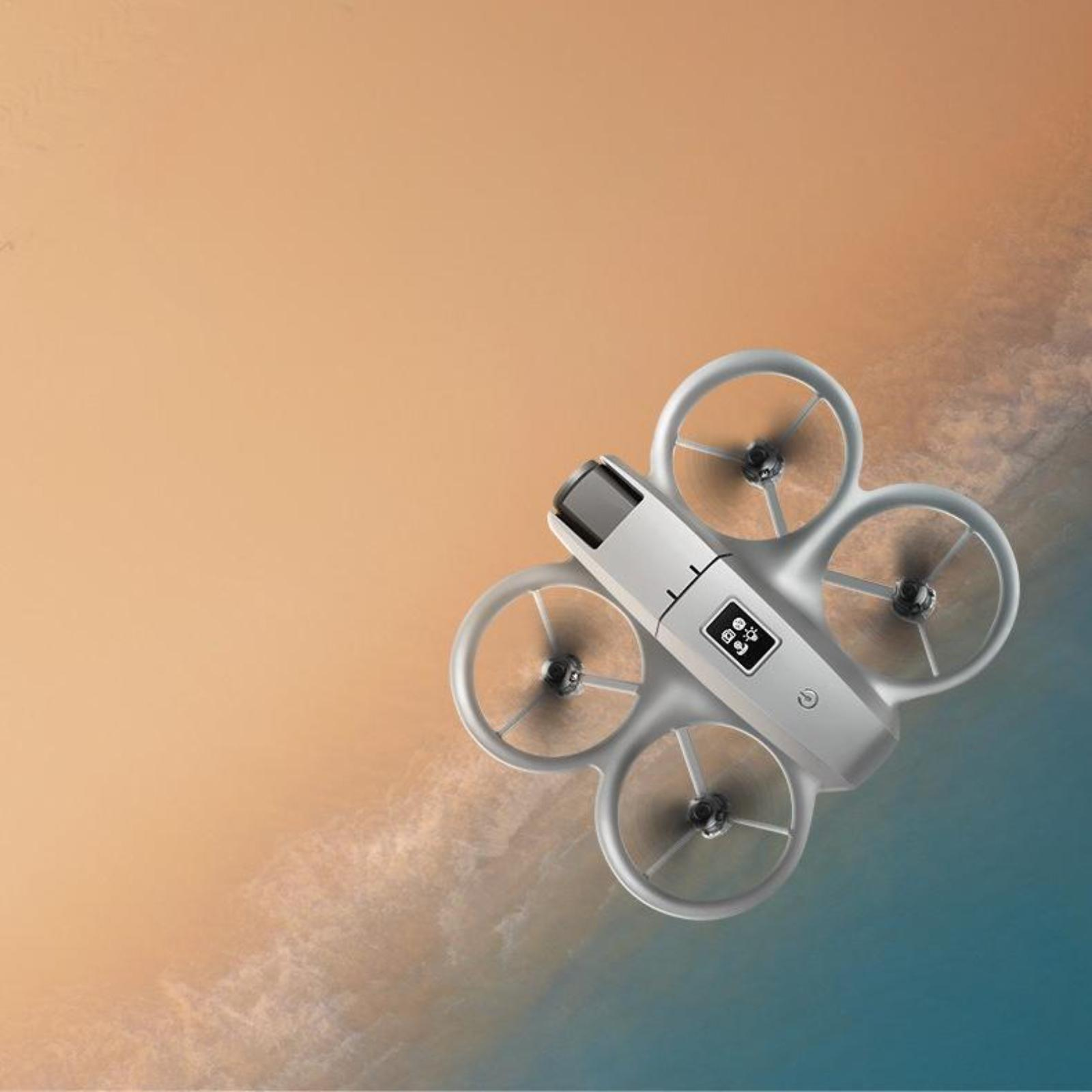 Eine Drohne scheint über einem Gradienten aus Orange und Blau zu fliegen.