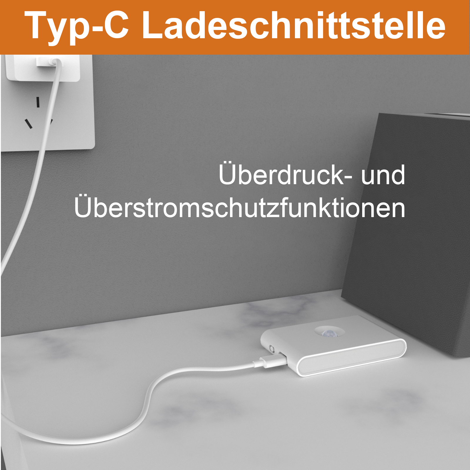 Ein weißes Gerät mit Ladekabel auf einem Tisch, mit Text über Überdruckschutz.
