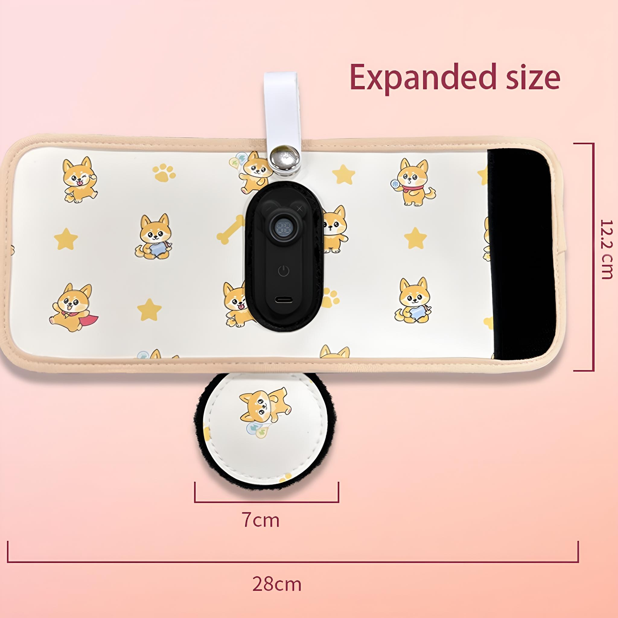 Produkt für Babys mit Hunde-Motiv. Rechteckiges Pad mit rundem Element und Maßen.